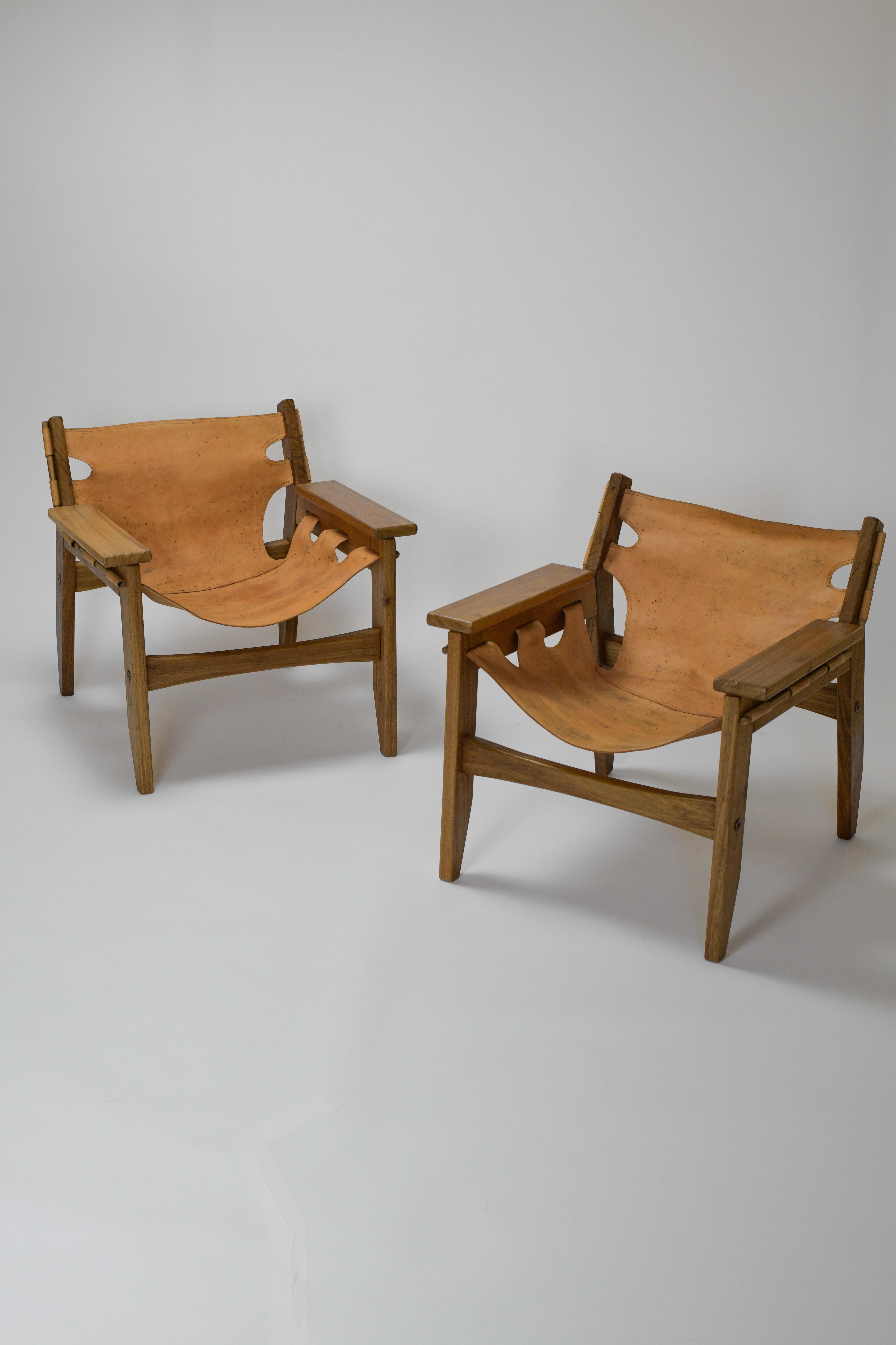 Pair of 'Kilin' armchairs designed by Sergio Rodrigues and manufactured in 1973 by Oct, Brazil.  Freijo, leather. Manufactured by Oca, Brazil. 

These are made from Freijo and Leather and are in very good vintage condition. Frames were refinished