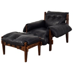 Sergio Rodrigues Moleca Chaise et pouf en cuir noir 1963:: moderne brésilien