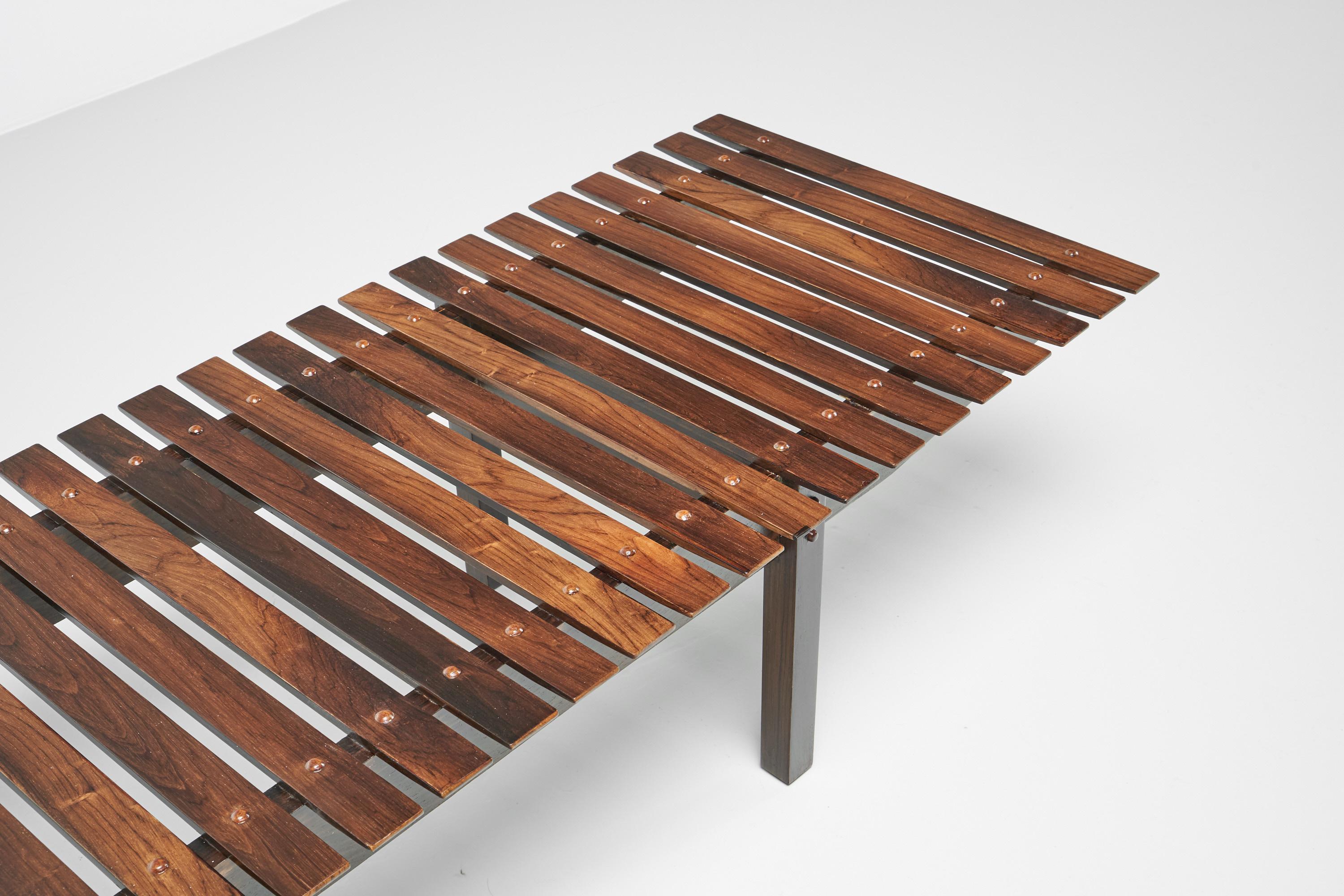 Beautiful and large sized so called 'Mucki' slat bench designed by Sergio Rodrigues and manufactured by Oca, Brazil 1959. This is the largest version made bench of the Mucki series and for me it is the one where the proportions are the nicest. It
