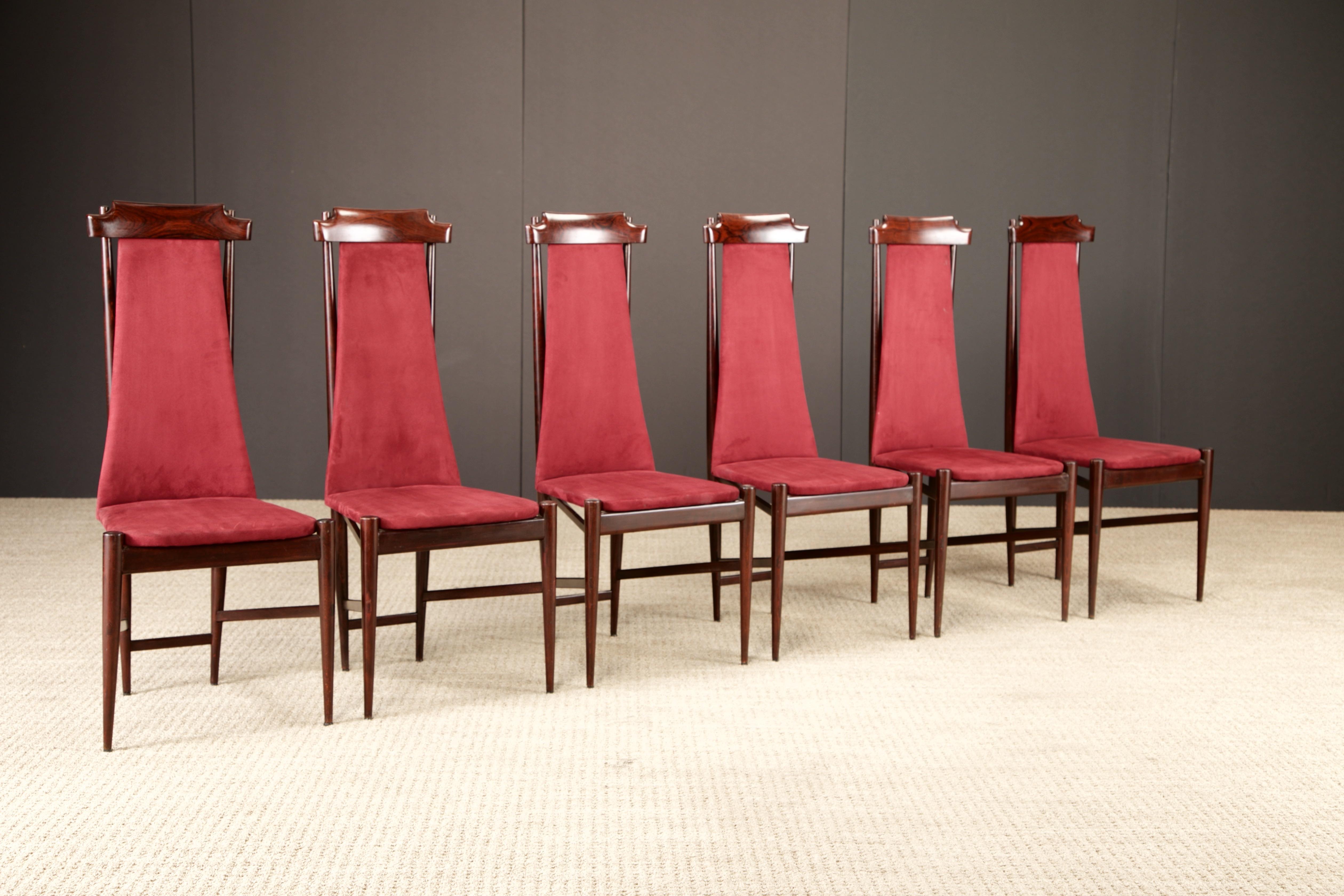 A refined and sculptural set of six dining chairs by Brazilian modernist Sergio Rodrigues, produced during the 1950s. These chairs feature tall, expressive backrests and finely crafted rosewood frames with elegant joinery, exotic wood grain and