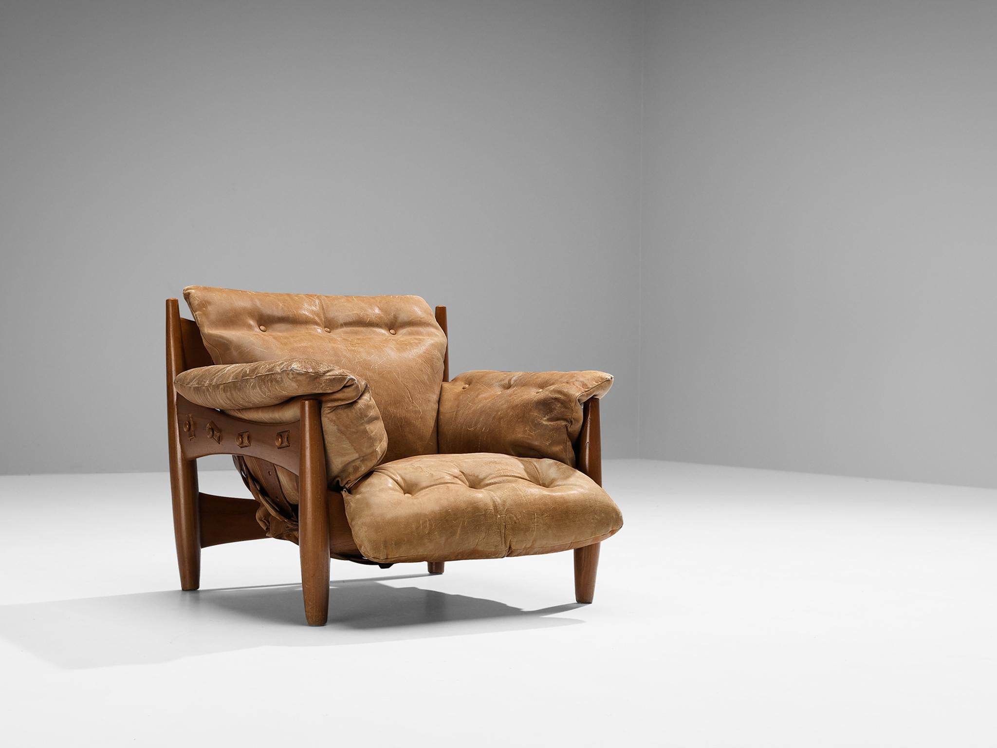 Sergio Rodrigues, 'Sheriff' lounge chair, leather, walnut, Brazil, 1960s.

Comfortable and extravagant lounge chair by Brazilian designer Sergio Rodrigues. This armchairs breathes the characteristics of Brazilian modern furniture design; low