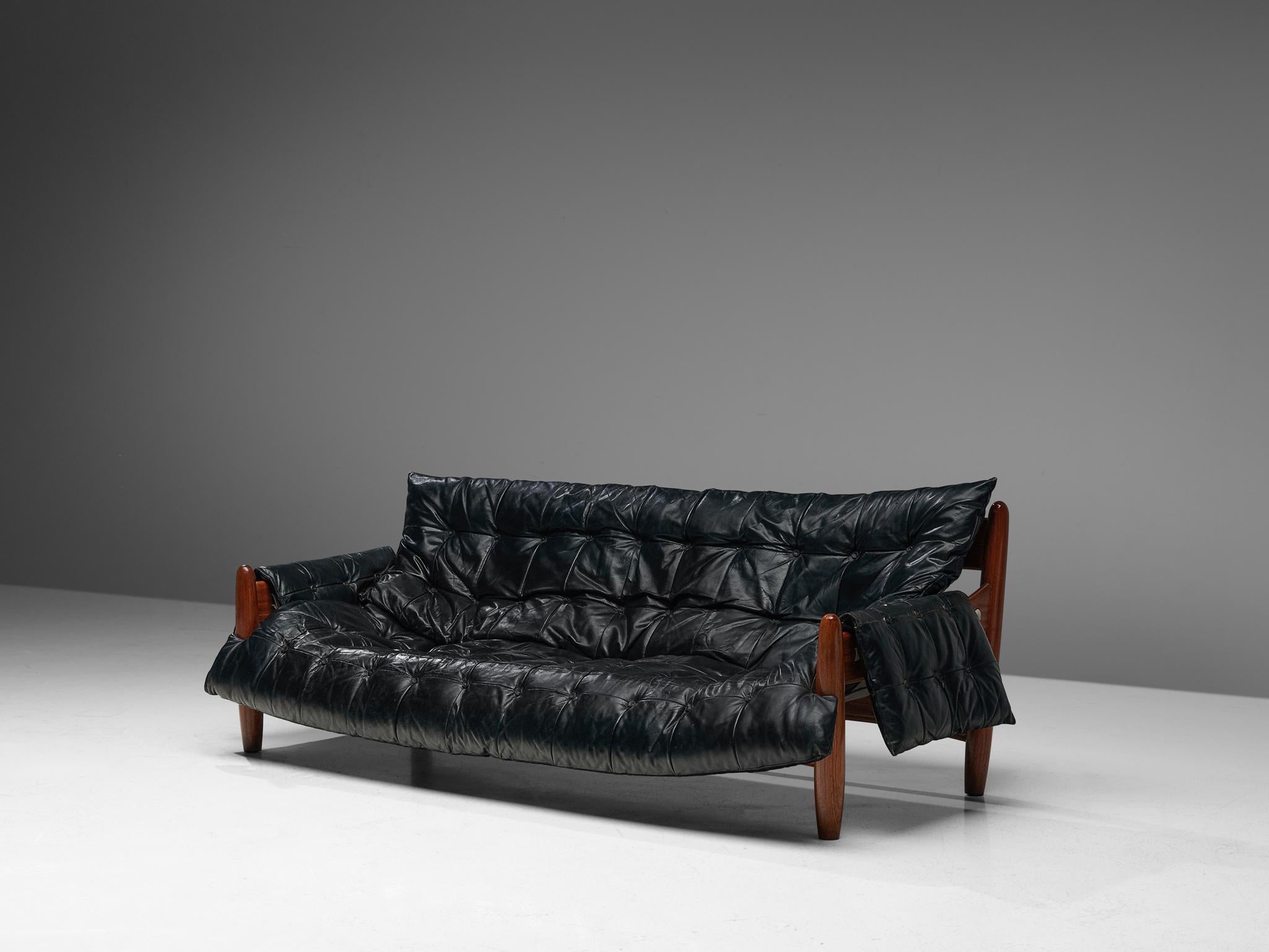 Sergio Rodrigues, 'Sheriff' sofa, faux leather, imbuia wood, Brazil, 1960s

Comfortable and large sofa by Brazilian designer Sergio Rodriques. This sofa breaths the characteristics of Brazilian modern furniture design. Made of traditional materials