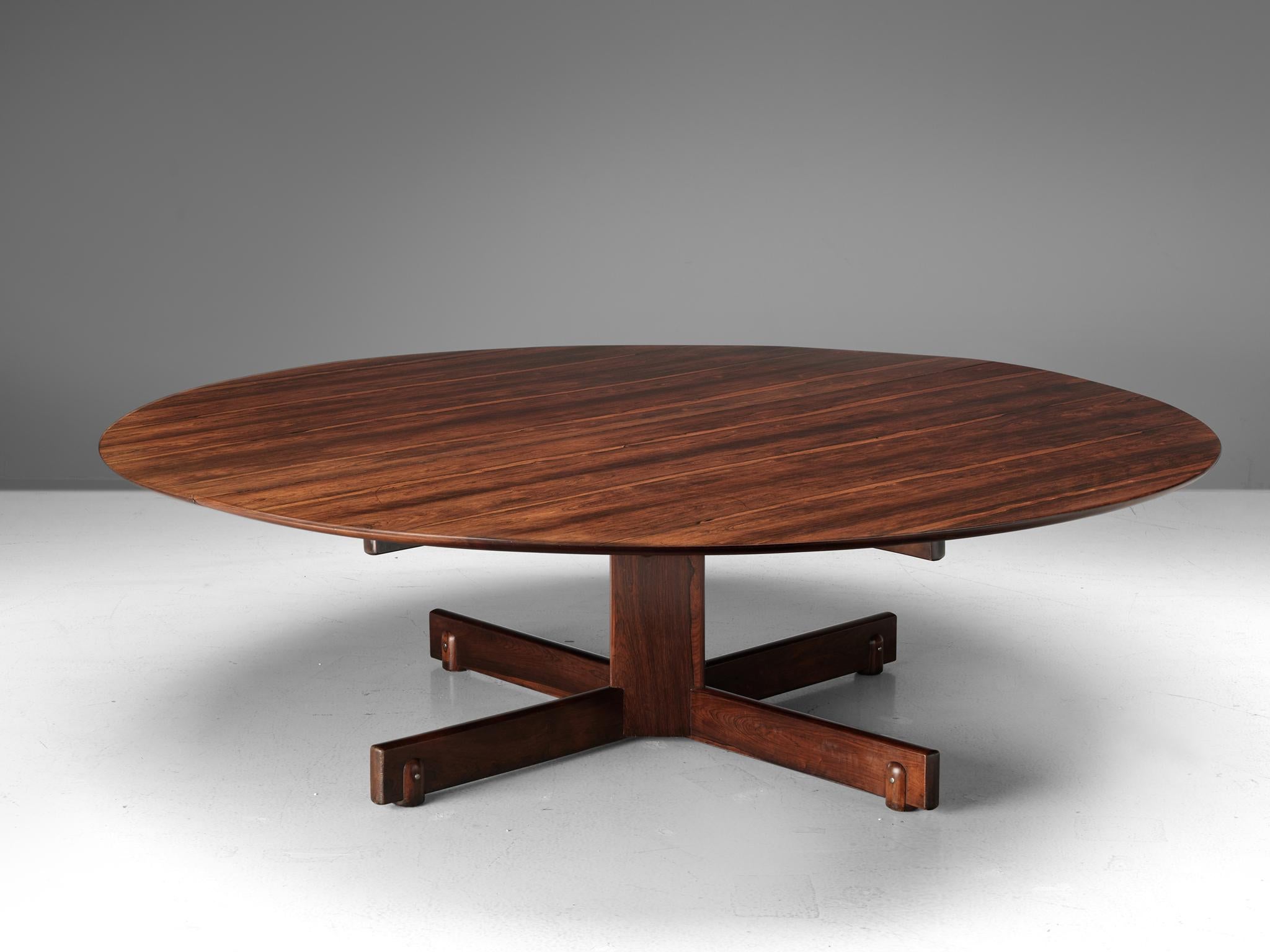Sergio Rodrigues, large rosewood table, Brazil, 1950s

This grand dining table has been custom made for a private client in Rio de Janeiro. The table has been in made on request and therefore it is a unique design. The table with a diameter of 250