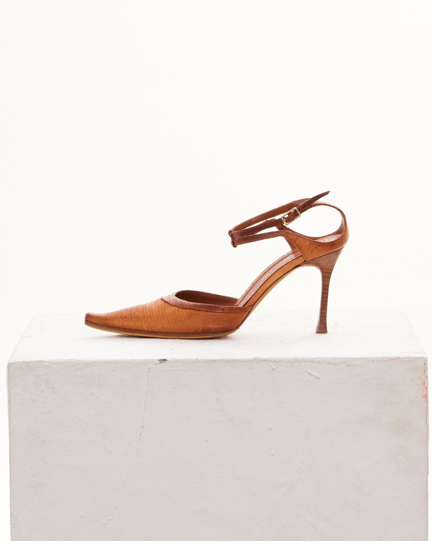 - Sergio Rossi early 2000s 
- Sold by Skof.Archive
- Brown lizard leather 
- Pointed toes 
- Buckled ankle straps 
- 8.5cm heels 
- Gold-tone hardware 
- Leather lining 
- Insoles and soles 
- Made in Italy 
- Good Conditions 
.- Comes without