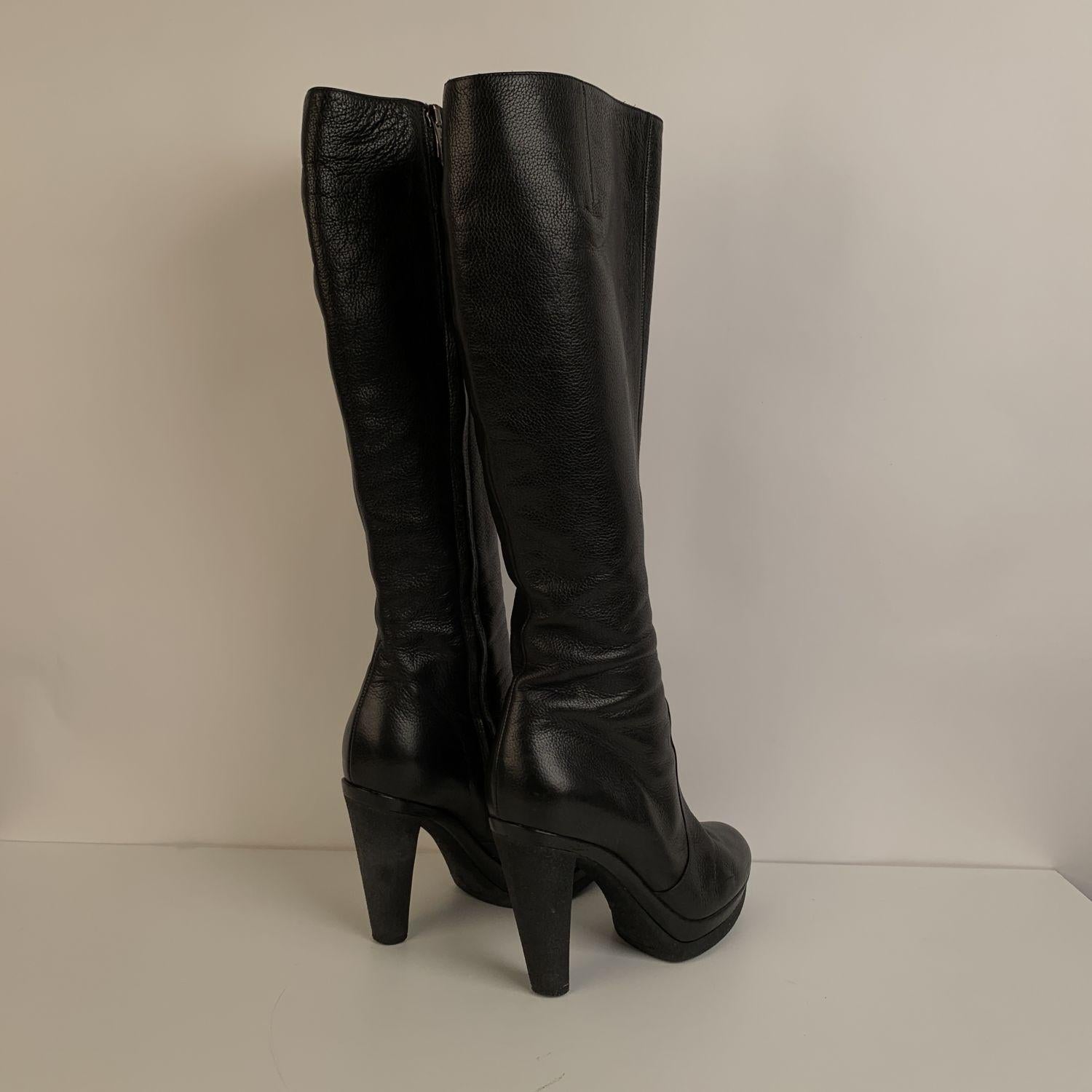 Sergio Rossi Black Leather Heeled Boots. Long side zip closure. Rubber outsoles and heels. Shaft height: 15 inches - 38,1 cm (from heel to top). Size:38.5 (The size shown for this item is the size indicated by the designer on the shoes). Patform