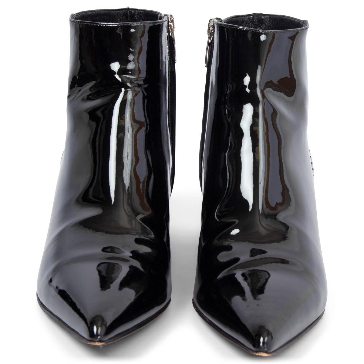 100% authentic Sergio Rossi pointed-toe ankle boots in black patent leather set on a block heel. Open with a zipper on the inside. Have been worn and are in excellent condition. 

Measurements
Imprinted Size	38
Shoe Size	38
Inside Sole	25cm