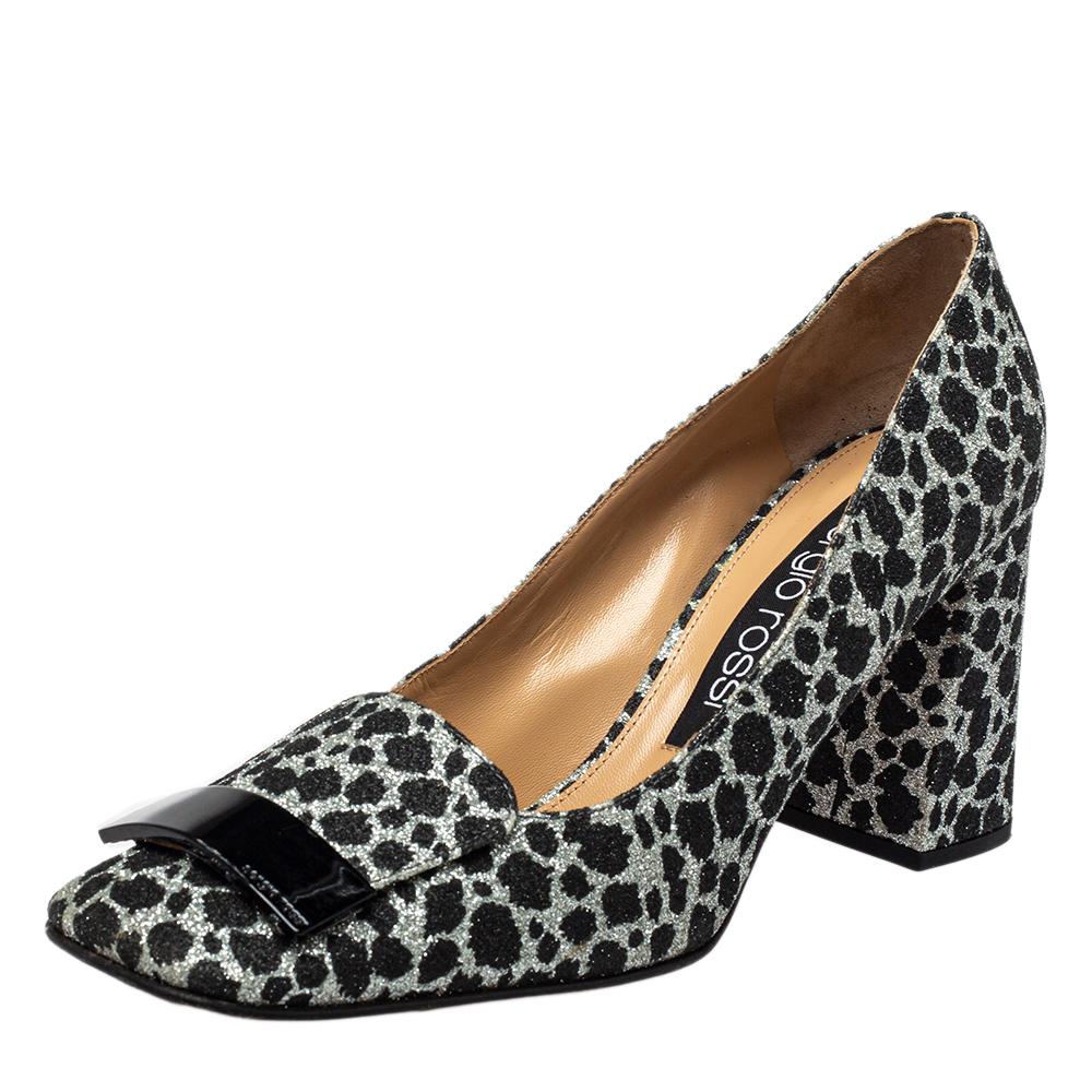 Add the right slant of fashion with these Sergio Rossi square-toe pumps. The pre-loved designer pumps are designed in an animal-printed style using glitter and comfortably lifted on block heels.

