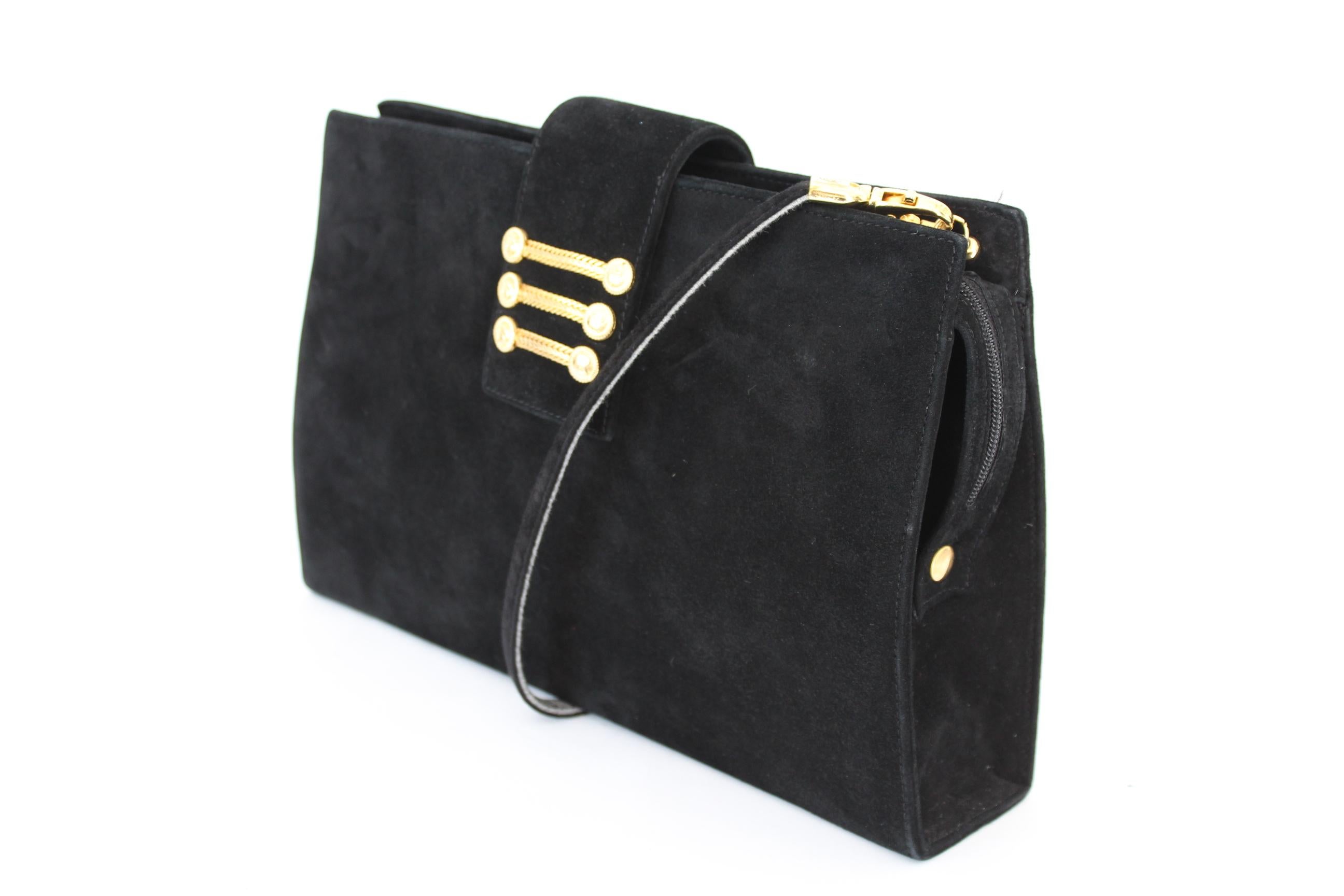 Sergio Rossi 80s vintage elegant bag. Square model rigid with shoulder strap, fabric in velvet, color black with details in color gold. Zip and button closure. Made in Italy. Excellent vintage conditions, the shoulder strap on the inside shows some