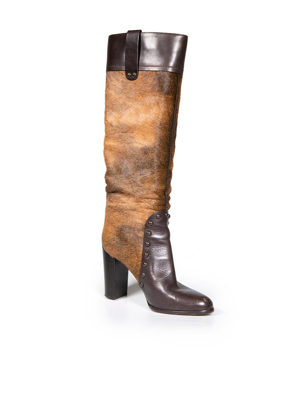 CONDITION is Very good. Minimal wear to boots is evident. Minimal wear to the toes and heels of both boots with abrasions and scratches on this used Sergio Rossi designer resale item.
 
 
 
 Details
 
 
 Brown
 
 Pony hair calfskin
 
 Knee high