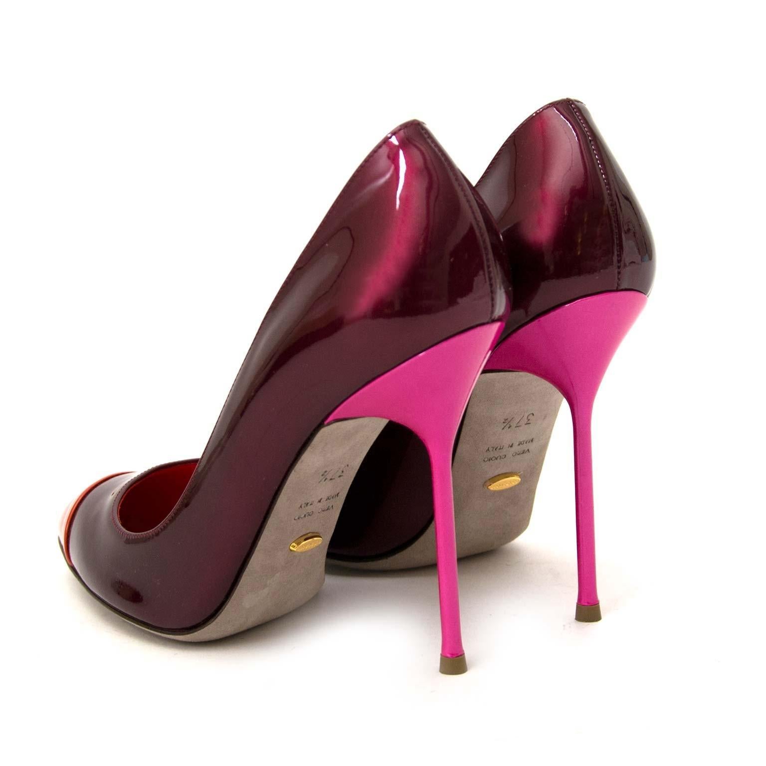 Excellent condition

Sergio Rossi Multicolor Patent Leather Cap Toe Lady Jane Pumps - Size 37.5

These beauties by Sergio Rossi are made from calfskin patent leather in three colors (a burgundy body, an orange toe tip and a pink heel). 

With these