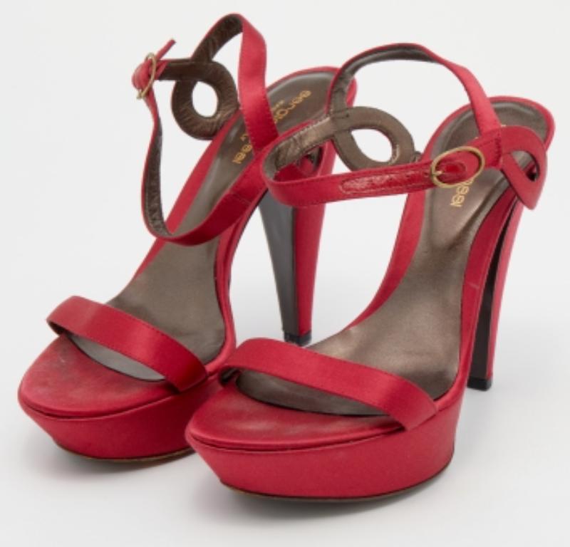 Sergio Rossi's shoes are a testament to the label's opulent and glamorous aesthetics. These ankle-strap sandals are made using smooth satin and are elevated by sturdy platforms. With their beautiful color, open-toes, and 12 cm high heels, they can