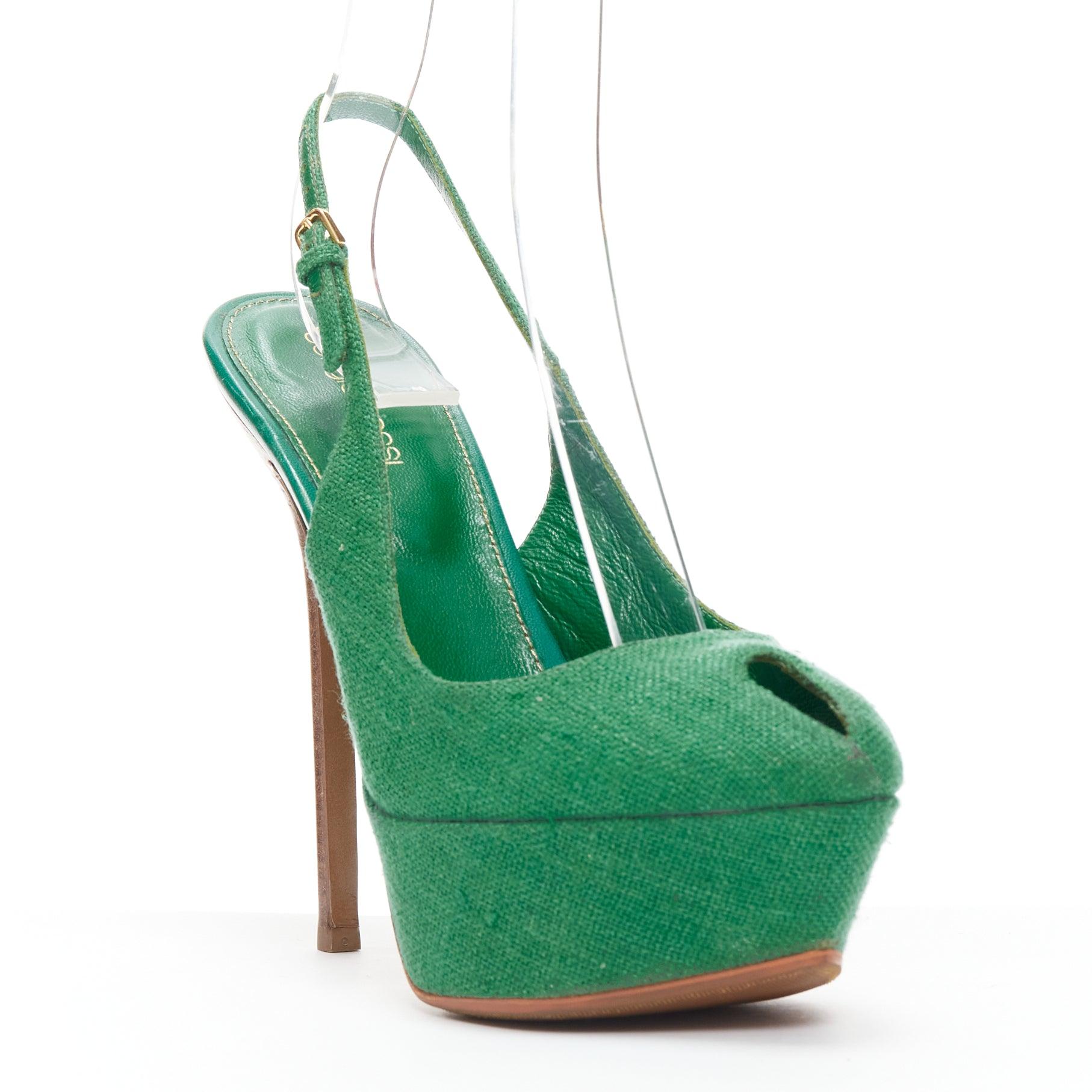 SERGIO ROSSI green canvas cachet peep toe platform slingback heel EU37
Reference: NKLL/A00124
Brand: Sergio Rossi
Material: Canvas, Wood
Color: Green, Brown
Pattern: Solid
Closure: Slingback
Lining: Green Leather
Extra Details: Gold-tone