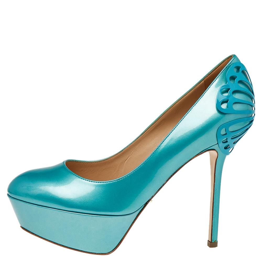 Flaunt a simplistic yet bold look with this pair of patent leather pumps. Created by Sergio Rossi these designer pumps feature butterfly accents on the counters and tall heels supported by platforms.