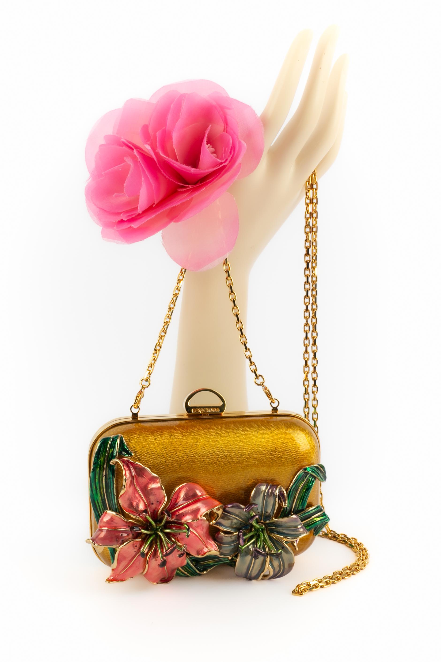 Sergio Rossi -(Made in Italy) Borsa minaudiere in metallo smaltato con fiori.

Condizioni:
Ottime condizioni

Dimensioni:
Altezza: 8 cm - Larghezza: 14 cm - Profondità: 5 cm

SKU:S21


