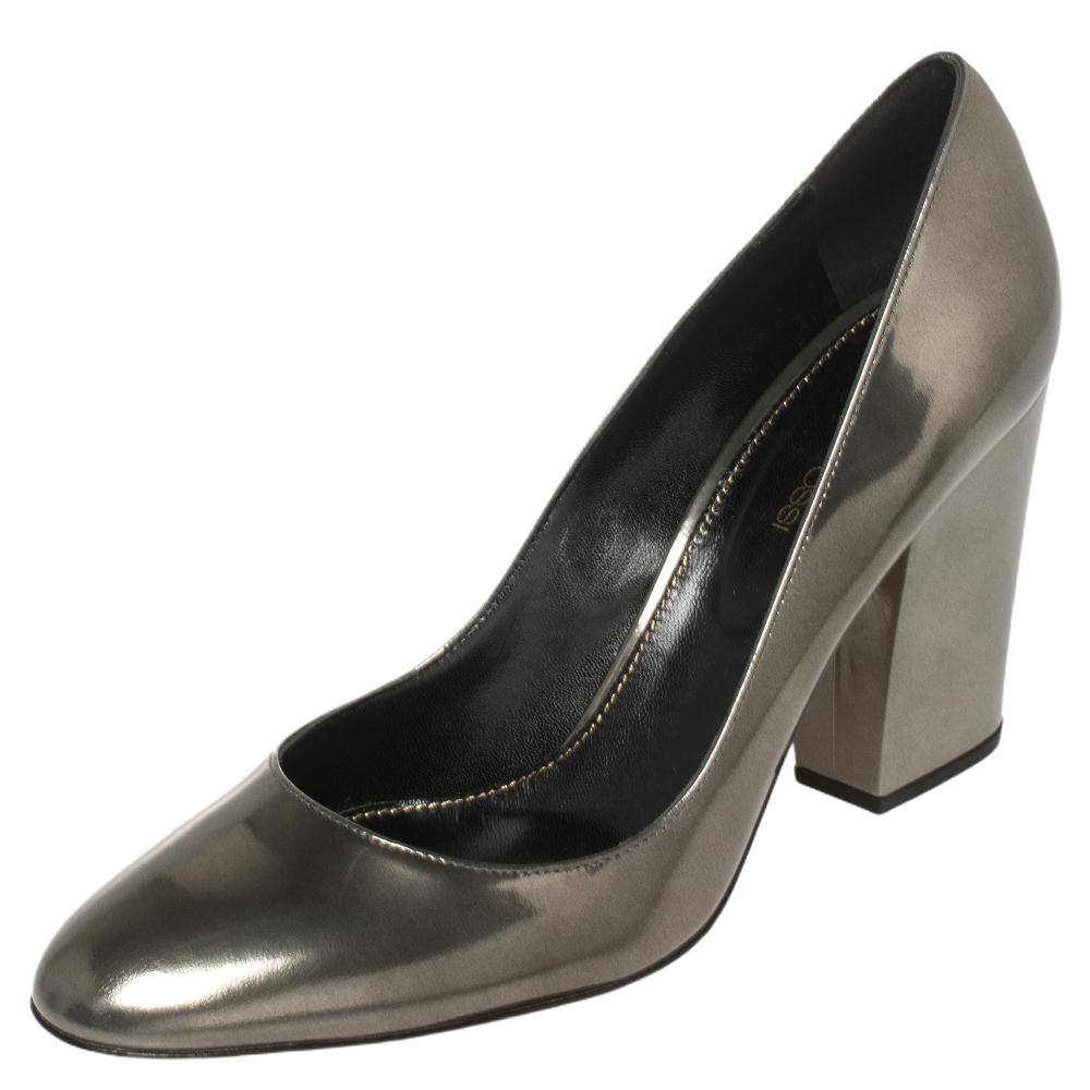 Sergio Rossi's timeless aesthetic and stellar craftsmanship in shoemaking is evident in these ageless pumps. Crafted from patent leather in an olive green shade, the pumps are detailed with almond toes and block heels.

