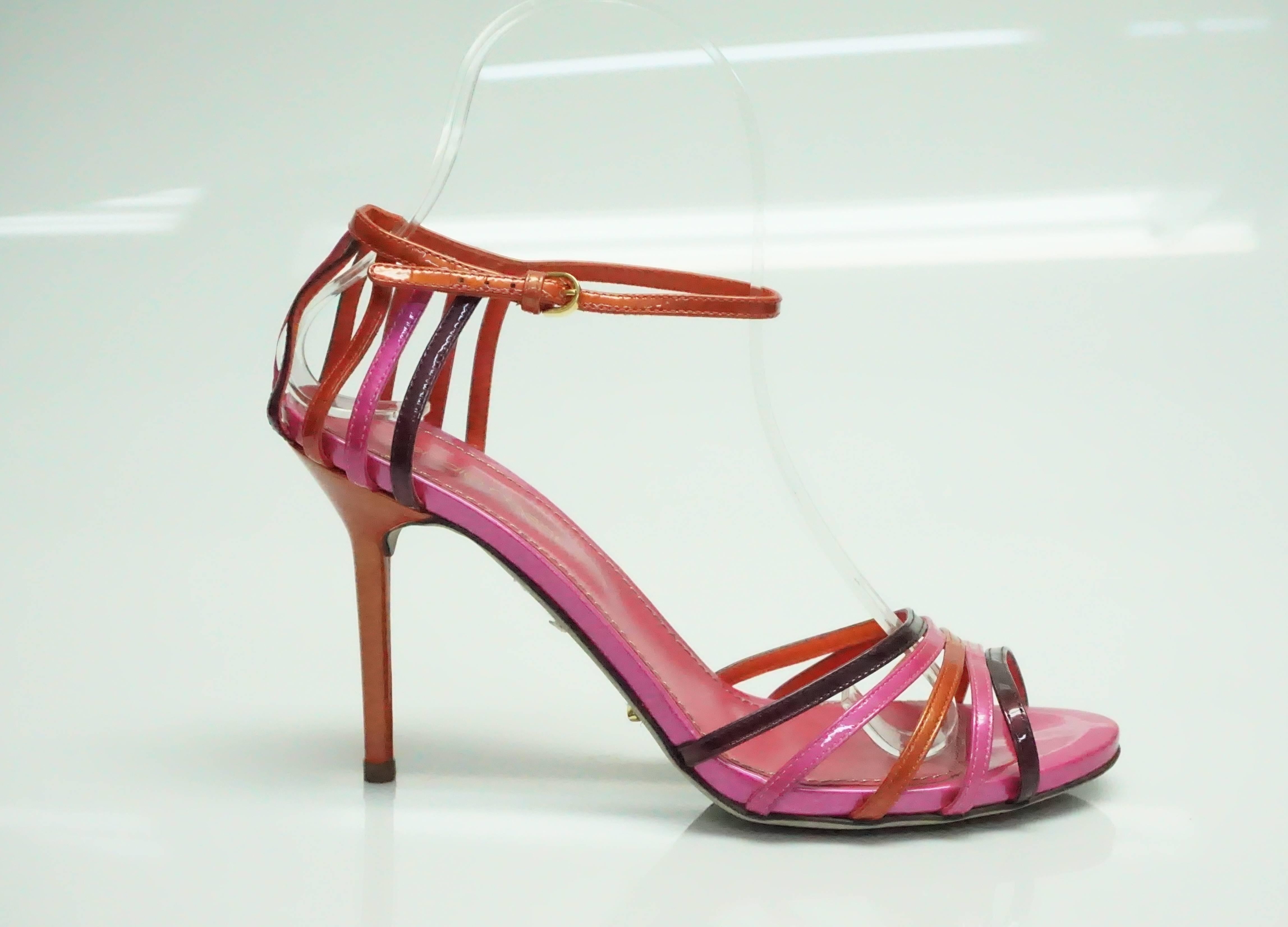 Sergio Rossi Pink and Orange Patent Strappy Sandal - 37  These beautiful and vibrant colored shoes are in excellent condition. The colors consist of orange, pink, and purple patent leather. The back of the heel has a strappy detail and is connected