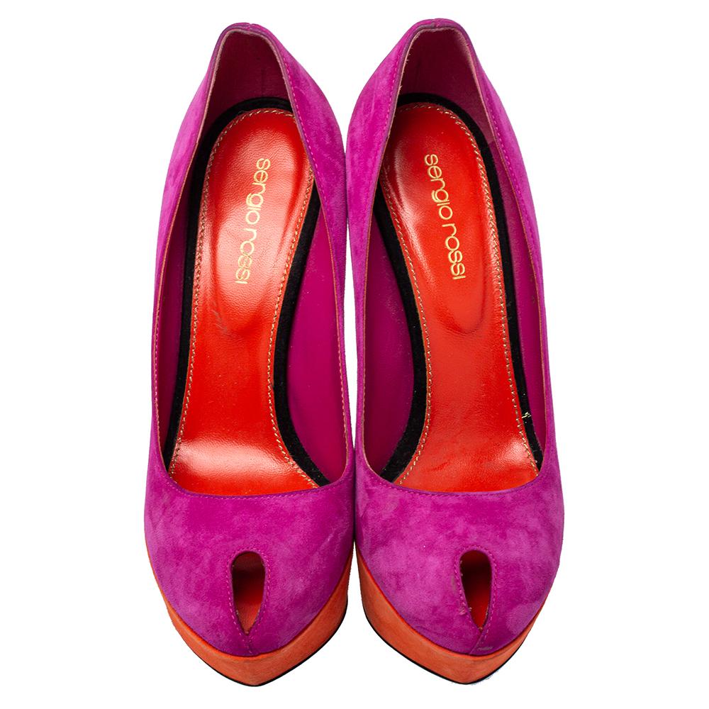 The timeless design and comfortable quality make this Sergio Rossi pair a great purchase. Crafted from suede, these designer pumps carry peep toes, 13.5 cm heels, and orange platforms that bring a beautiful contrast to the purple uppers.

