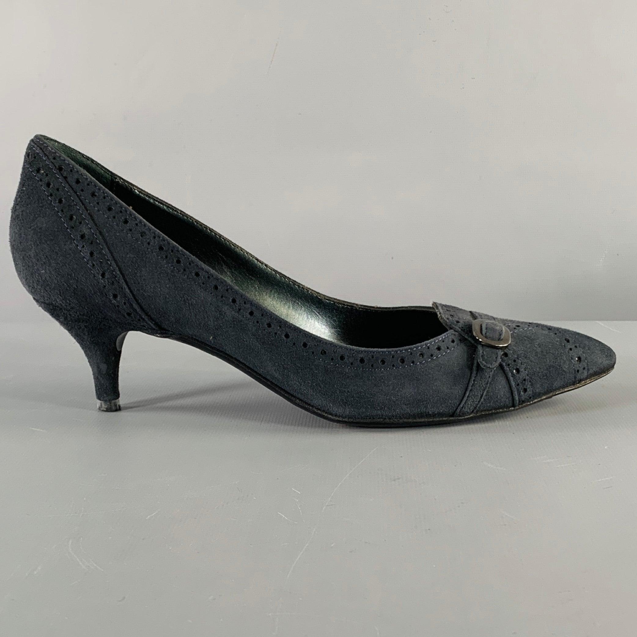 SERGIO ROSSI pumps
in a navy suede fabric featuring a perforated style, kitten heel, and gunmetal tone buckle accents. Made in Italy.Very Good Pre-Owned Condition. Moderate signs of wear. 

Marked:   36.5 

Measurements: 
  Heel: 2.25 inches 
  
  
