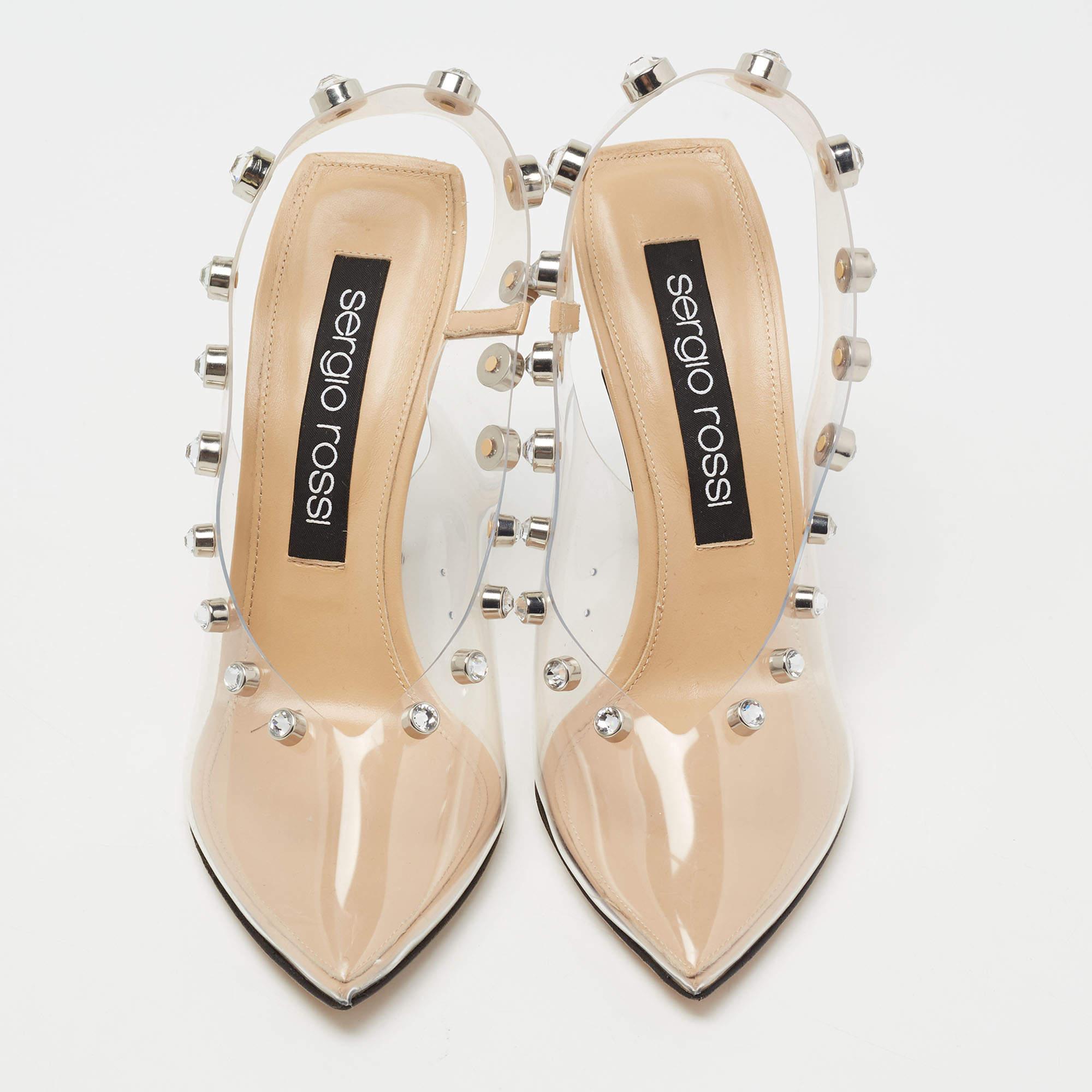This timeless pair of pumps from Sergio Rossi looks even better on the feet. The shoes have an elegant design made from clear PVC, complemented by 11 cm heels, crystal studs, and slingbacks for a sleek finish.

