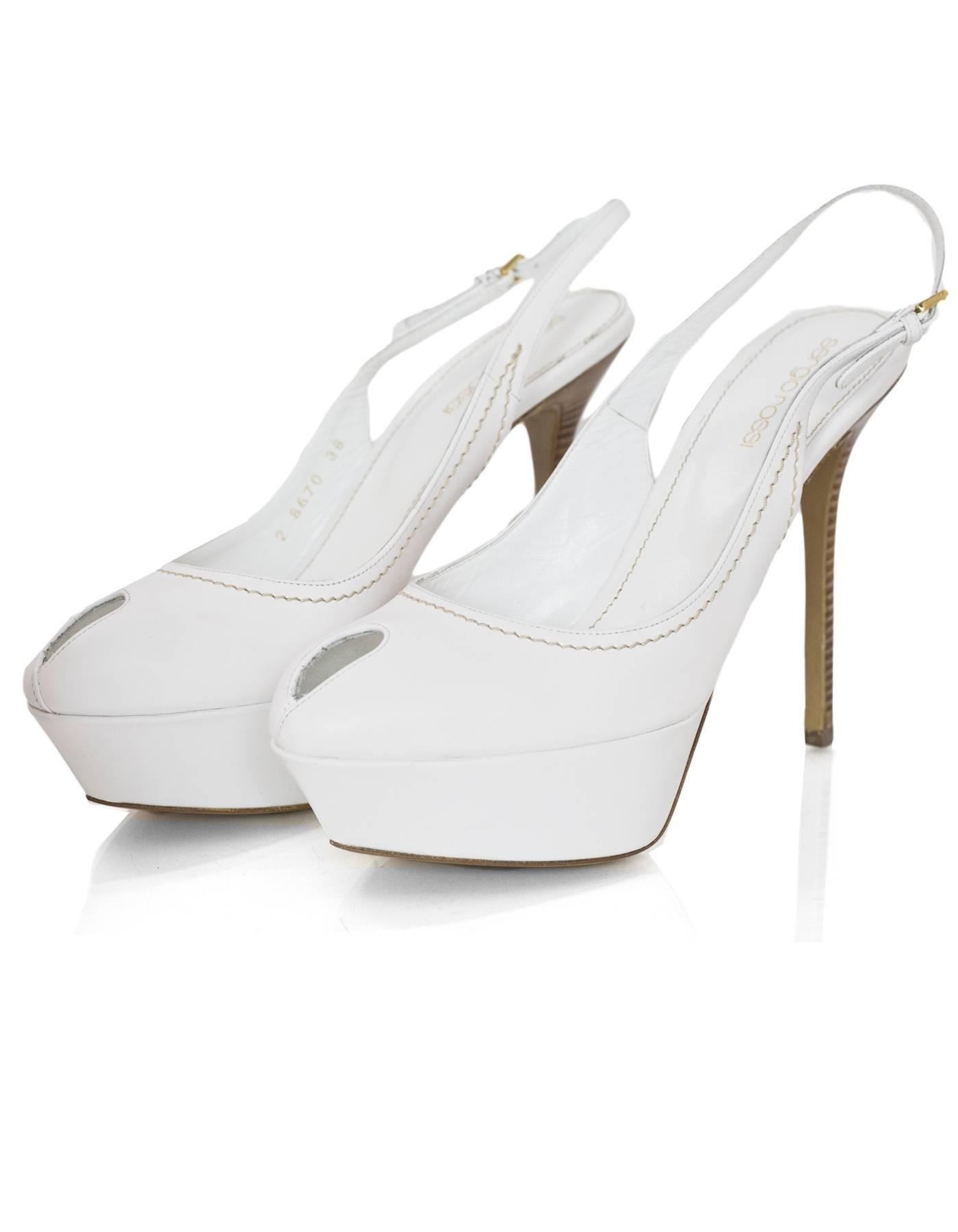 Sergio Rossi White Leather Peep-toe Pumps Sz 38 NIB

Made In: Italy
Color: White
Materials: Leather
Closure/Opening: Slingback
Sole Stamp: Sergio Rossi Vero Cuoio Made in Italy 38
Overall Condition: Excellent pre-owned condition - NIB
Included:
