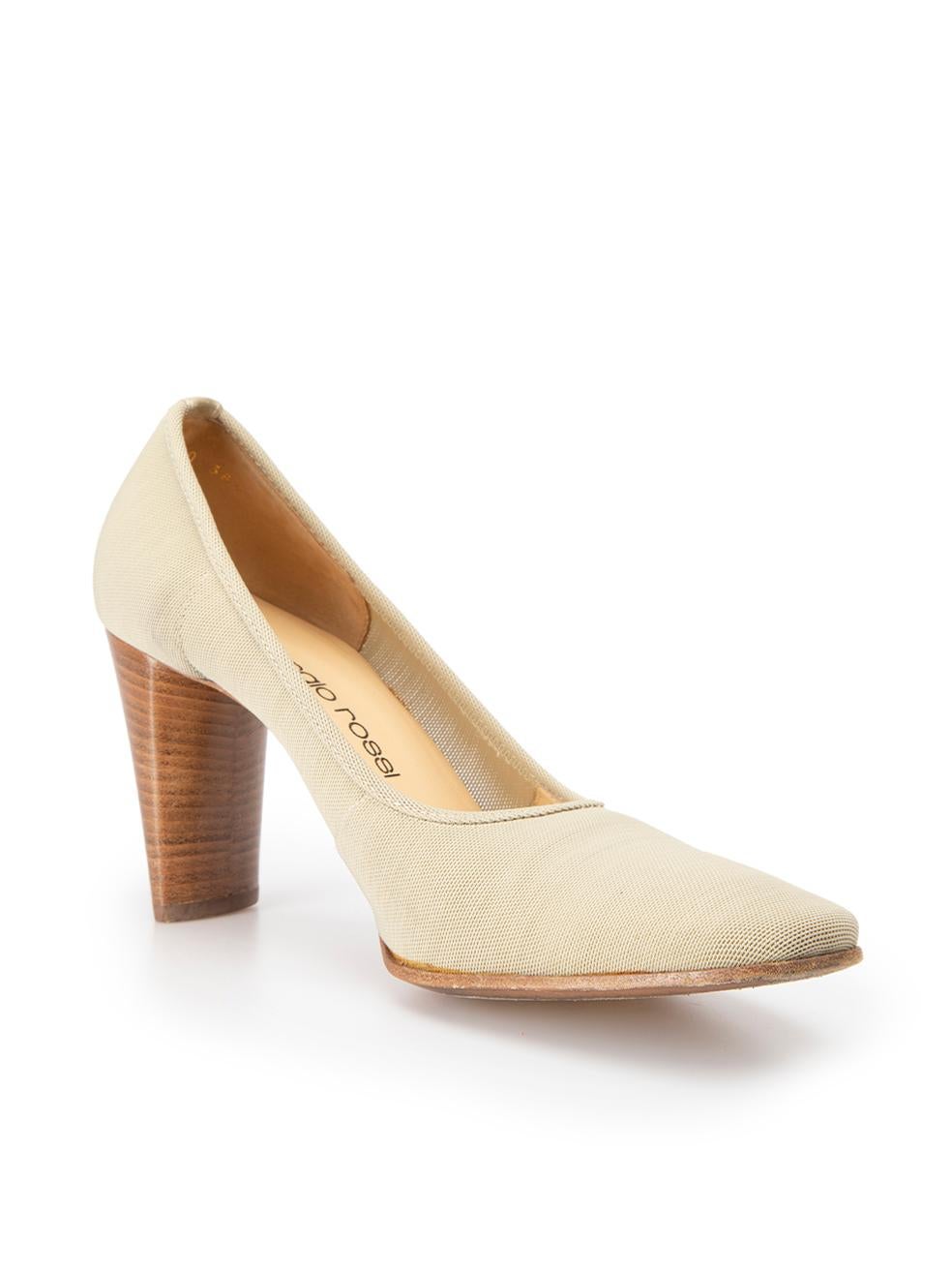 CONDITION is Very good. Minimal wear to shoes is evident. Light scuffs to heel blocks and light wear to soles on this used Sergio Rossi designer resale item. 
 
 Details
  Beige
 Canvas
 Slip on pumps
 Round-square toe
 High heel
 Leather interior

