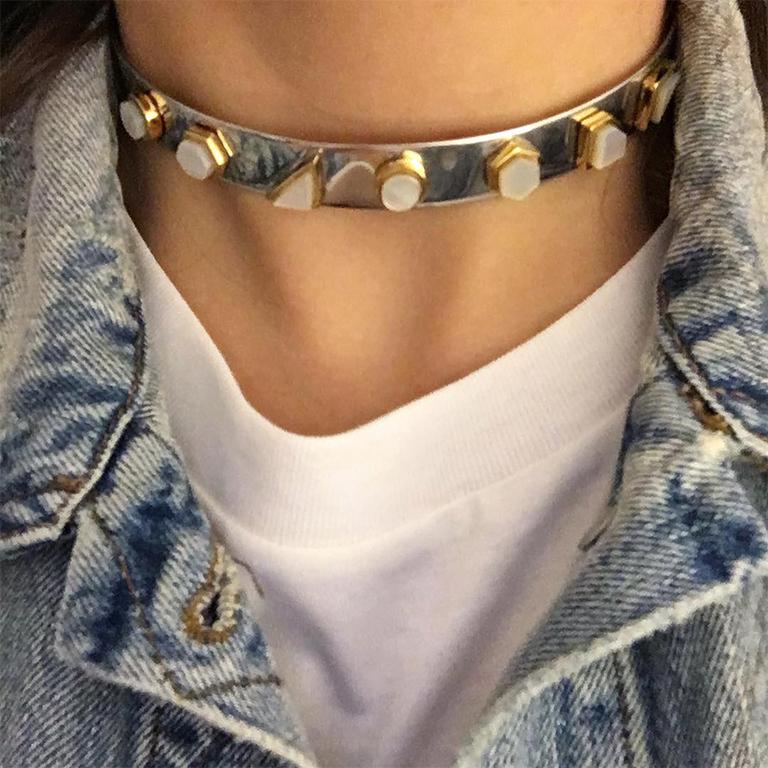 This choker is both feminine and edgy with yellow silver geometric shapes on a sterling white silver base. Perfect for making a statement.