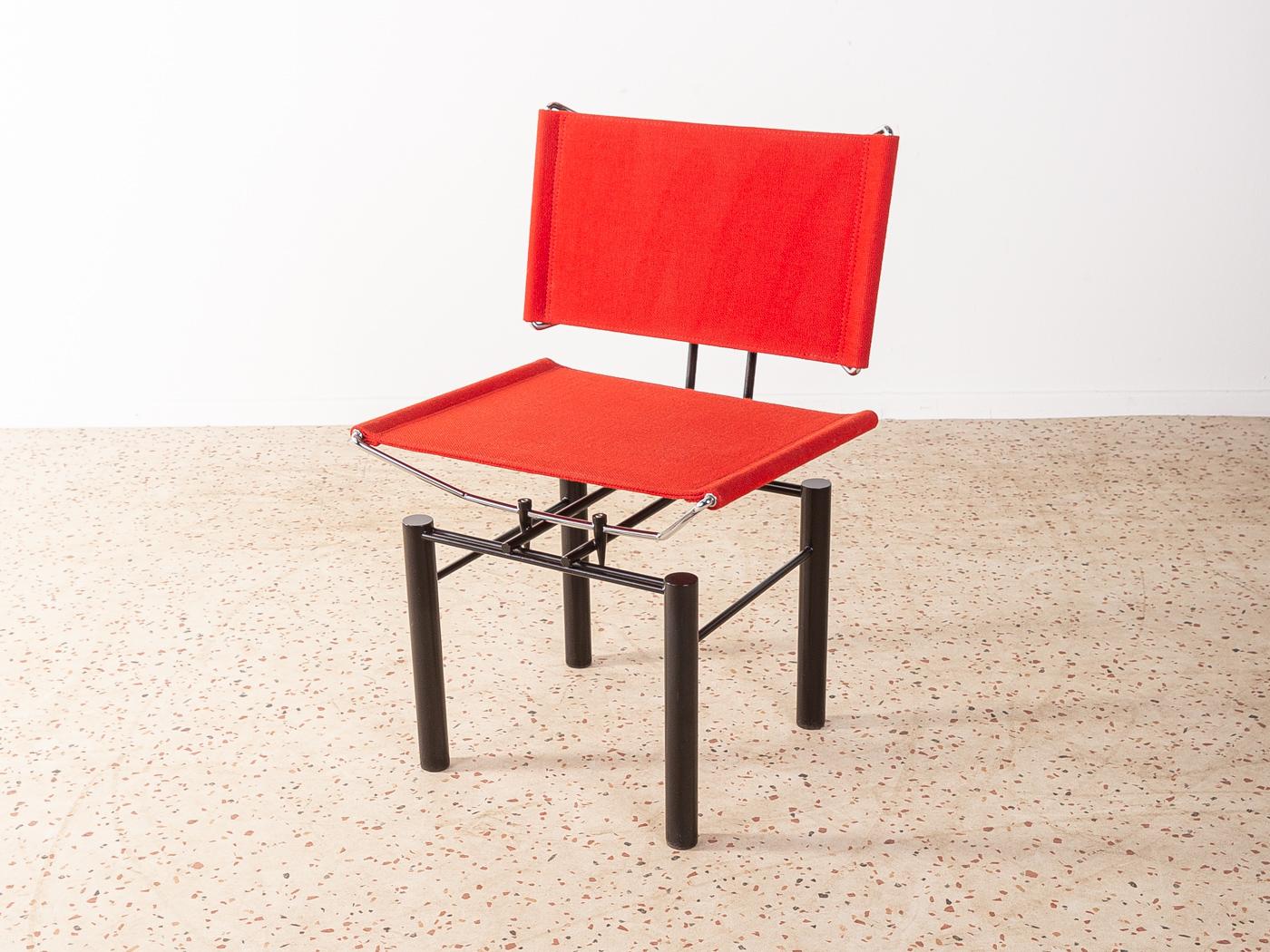 Extraordinary lounge chair from the series 8600 by Hans-Ullrich Bitsch for Kusch & Co from the 1980s. High-quality chromed metal frame with thick fabric seat and backrest in red.

Quality Features:
 very good workmanship
 high-quality