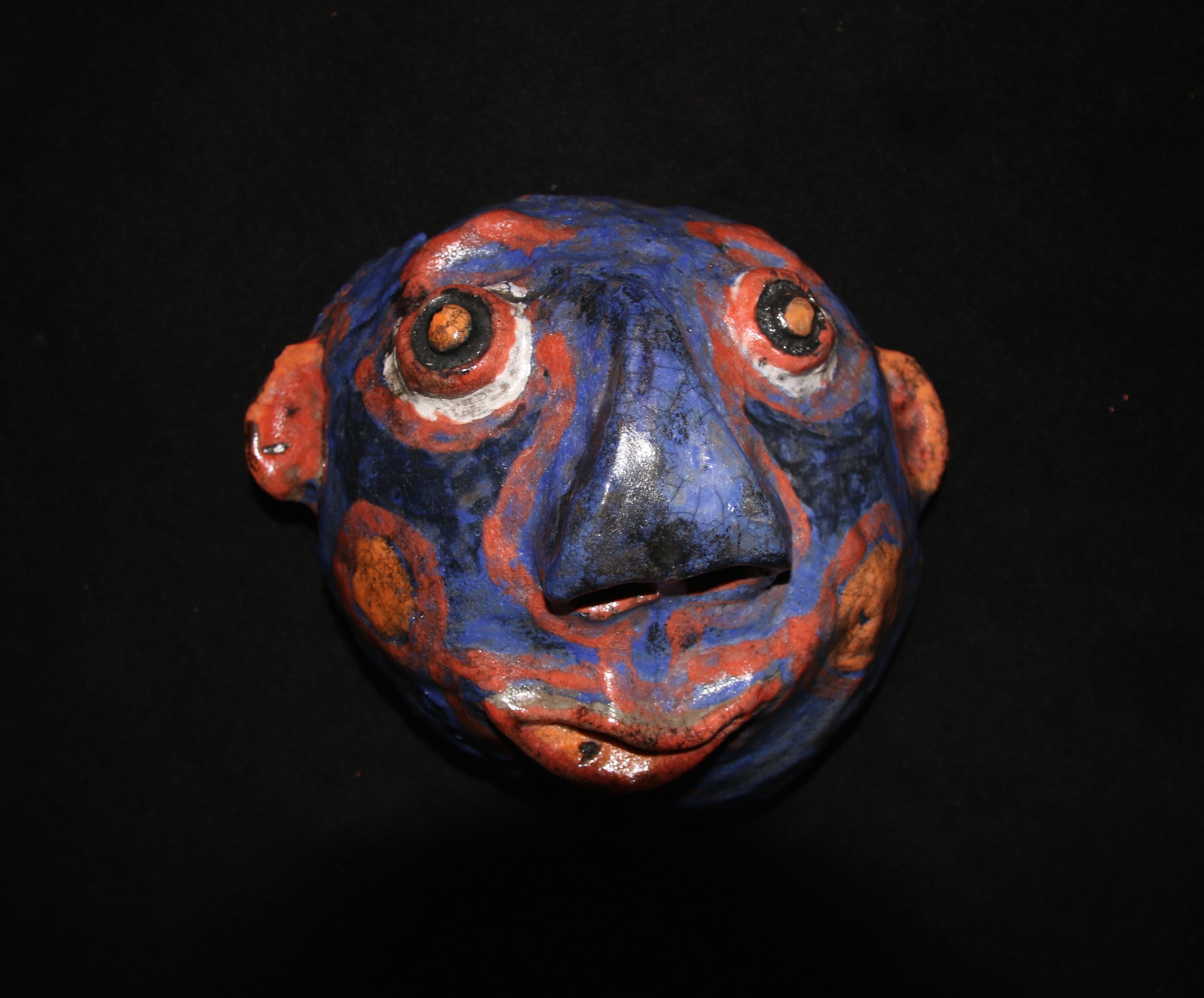 Francky Criquet. Born in 1968.
Glazed stoneware masks. Human and animal faces. Each piece is unique
Dimensions: between 25 and 35 cm.