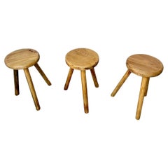 Series of 3 DLG Charlotte Perriand tripod stools