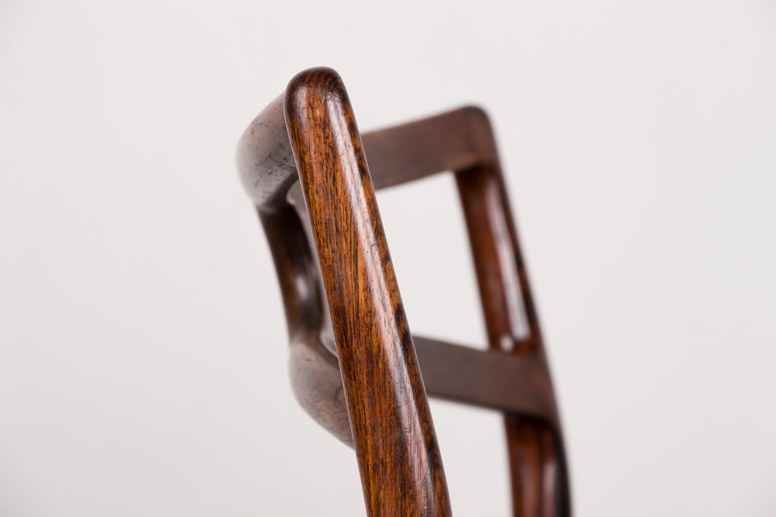 Series of 4 Danish chairs in Rosewood and Leather model 94 by Johannes Andersen. 9