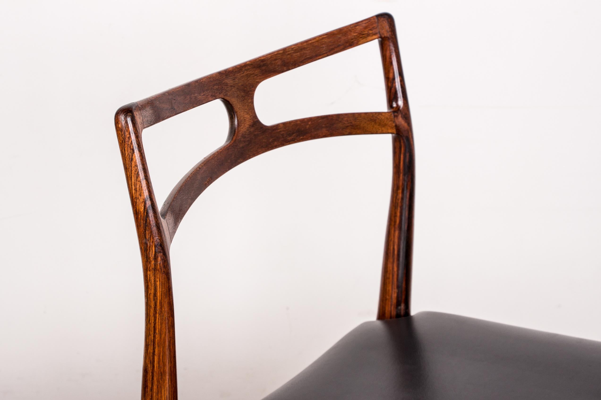 Series of 4 Danish chairs in Rosewood and Leather model 94 by Johannes Andersen. 4