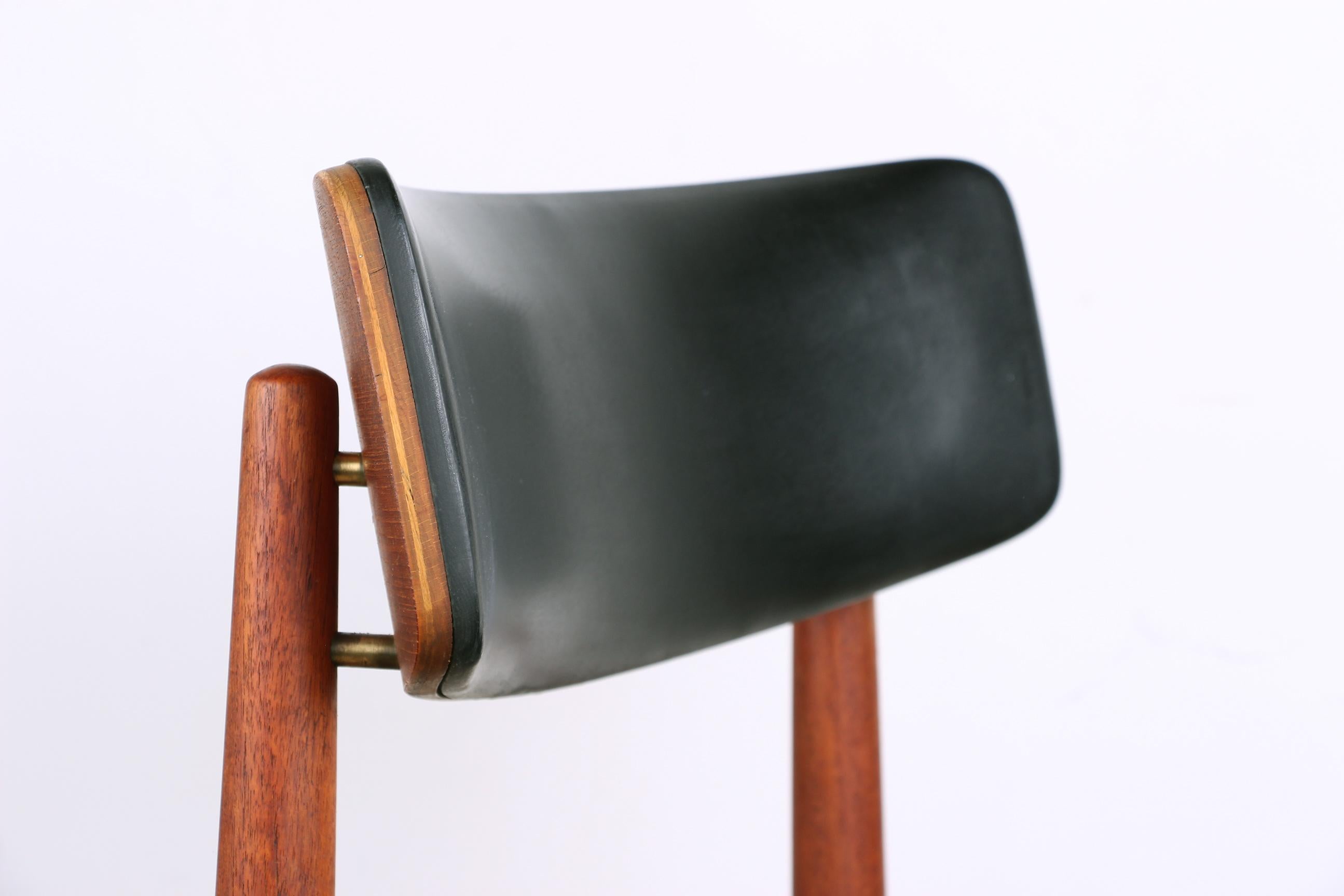 Mid-20th Century Series of 4 Danish chairs in Teak, black Skai and Brass by Sven Chrobat for Sax