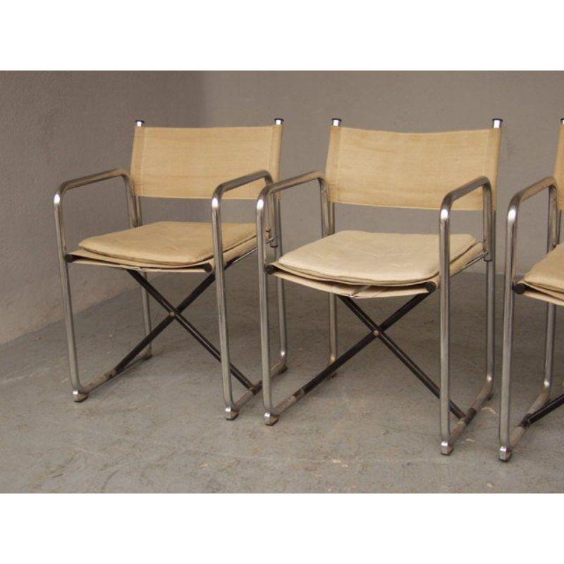 Series of 4 tubular armchairs 70. Folded and chromed tubes. The seats are to be cleaned or even refilled for one of them. These chairs are foldable (see photos). Dimension 52 cm wide for a height of 79 cm and a depth of 43 cm.

Additional