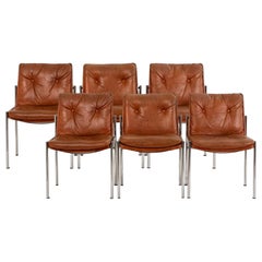 Series of 6 chairs in leather and chromed metal, 1970s