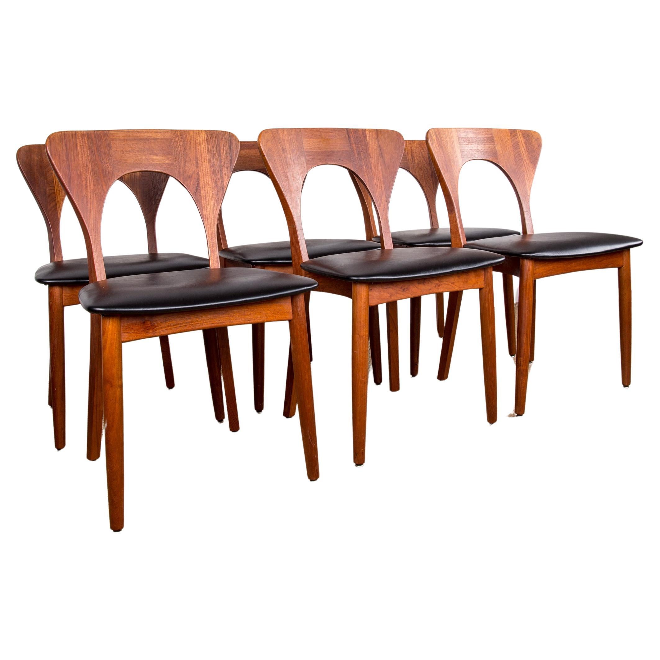 Série de 6 chaises danoises en teck et skai, modèle Peter de Niels Koefoed, 1960.