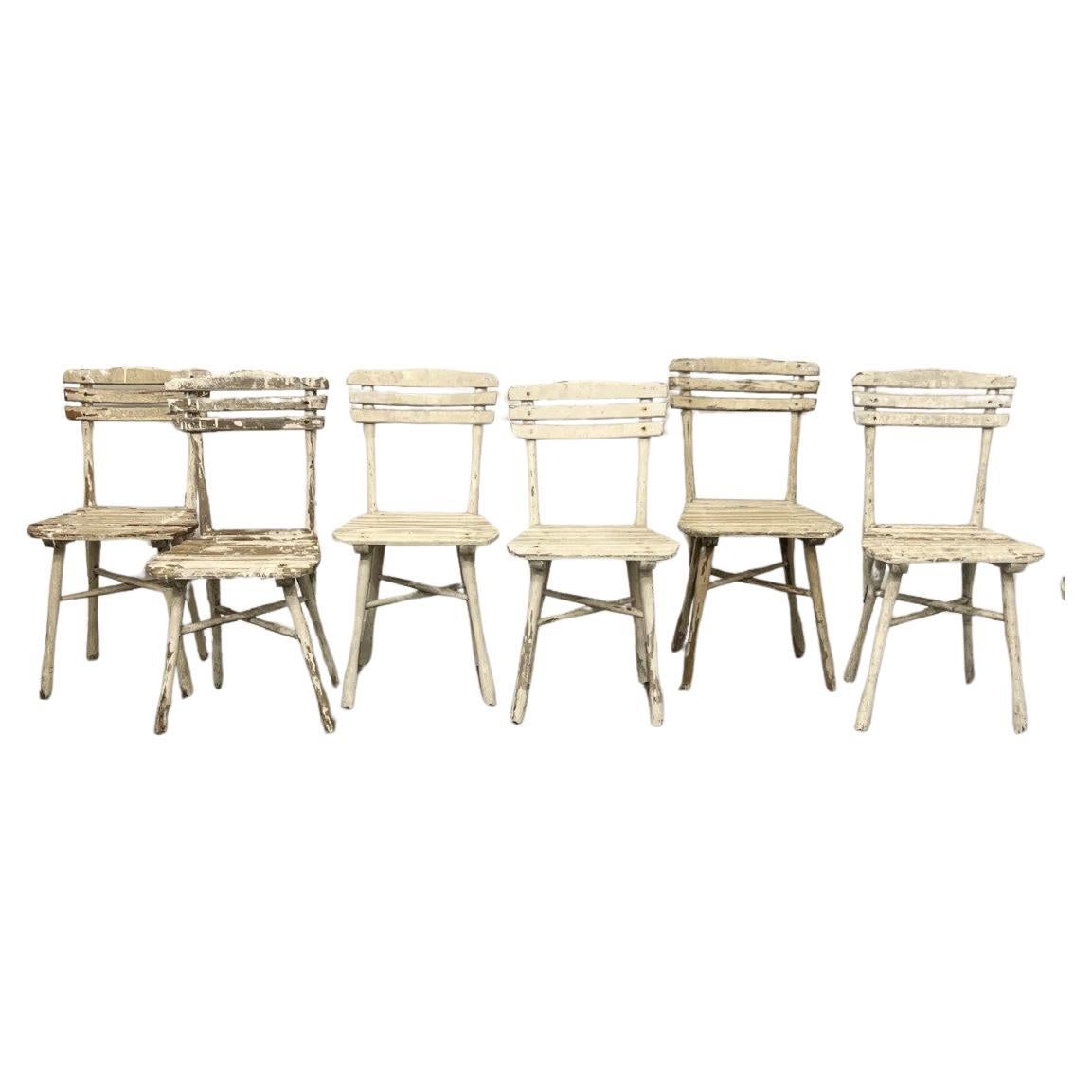 series of 6 garden or veranda chairs in painted wood circa 1900/1930 Thonet For Sale