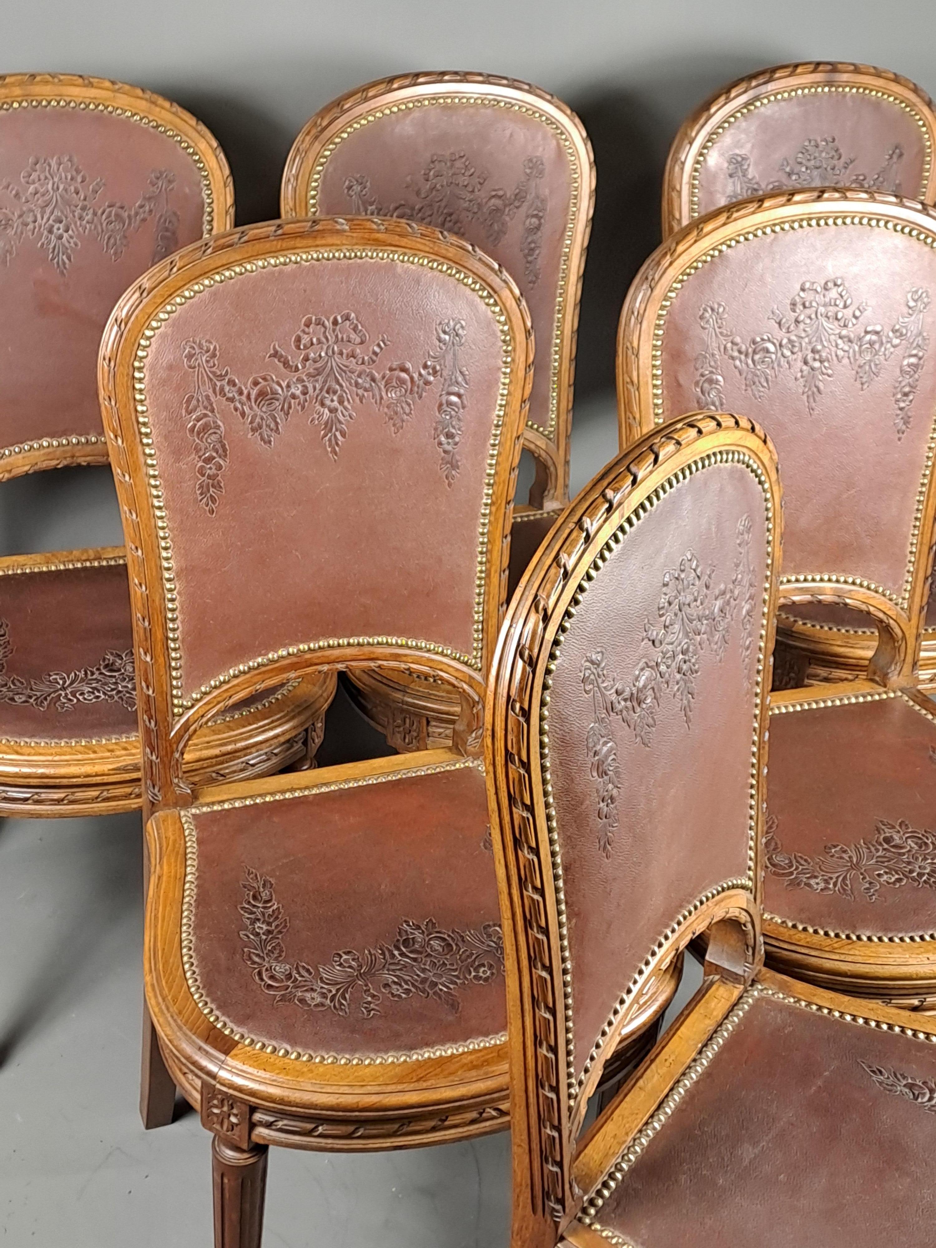 Series Of 6 Louis XVI Style Chairs In Solid Walnut And Embossed Cordoba Leather  In Good Condition For Sale In BARSAC, FR