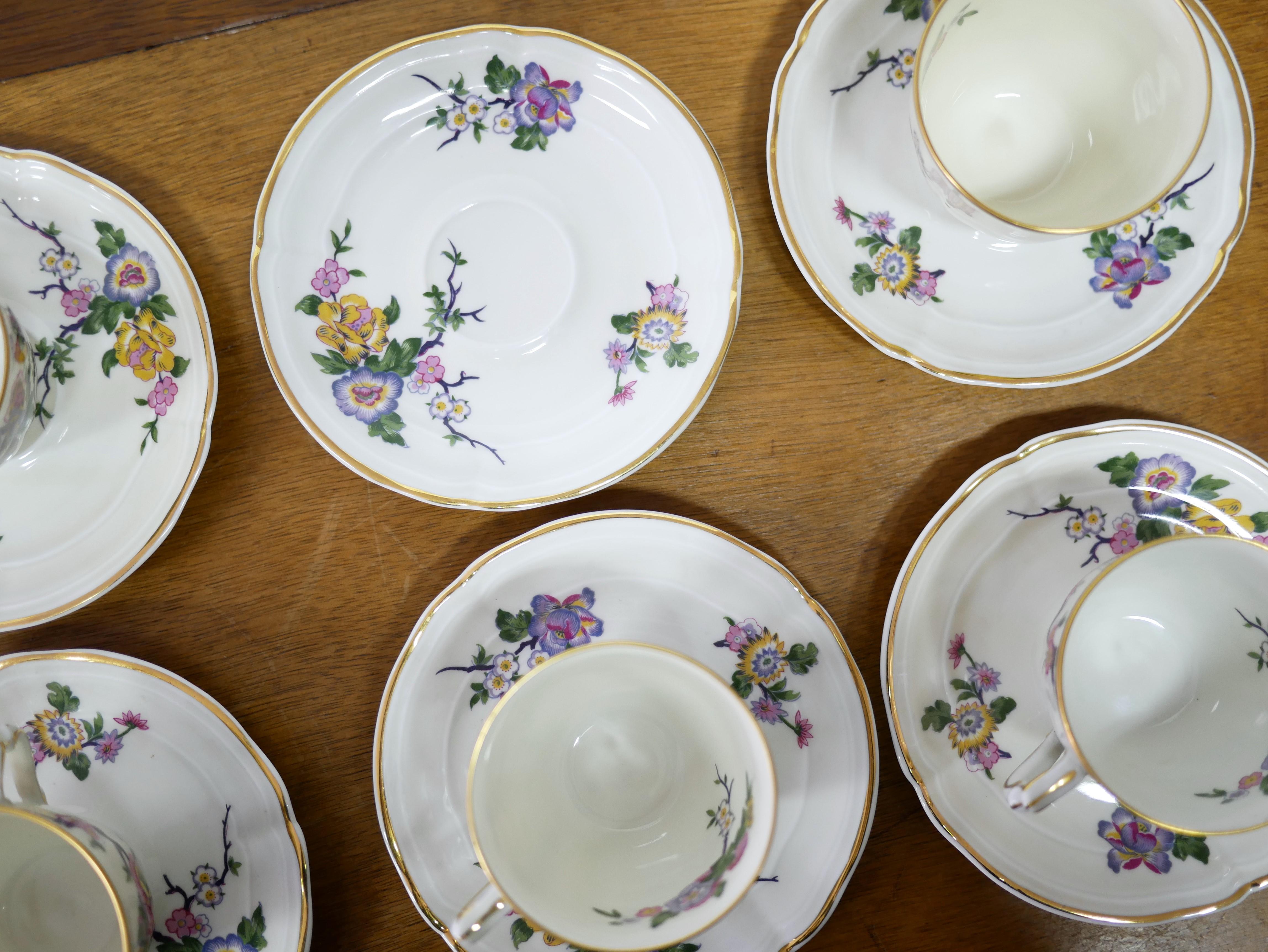Series of 8 coffee cups and under cup in Limoges porcelain, Bernardaud France For Sale 3