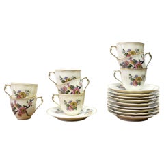 Serie de 8 tazas de café y bajo taza en porcelana de Limoges, Bernardaud Francia