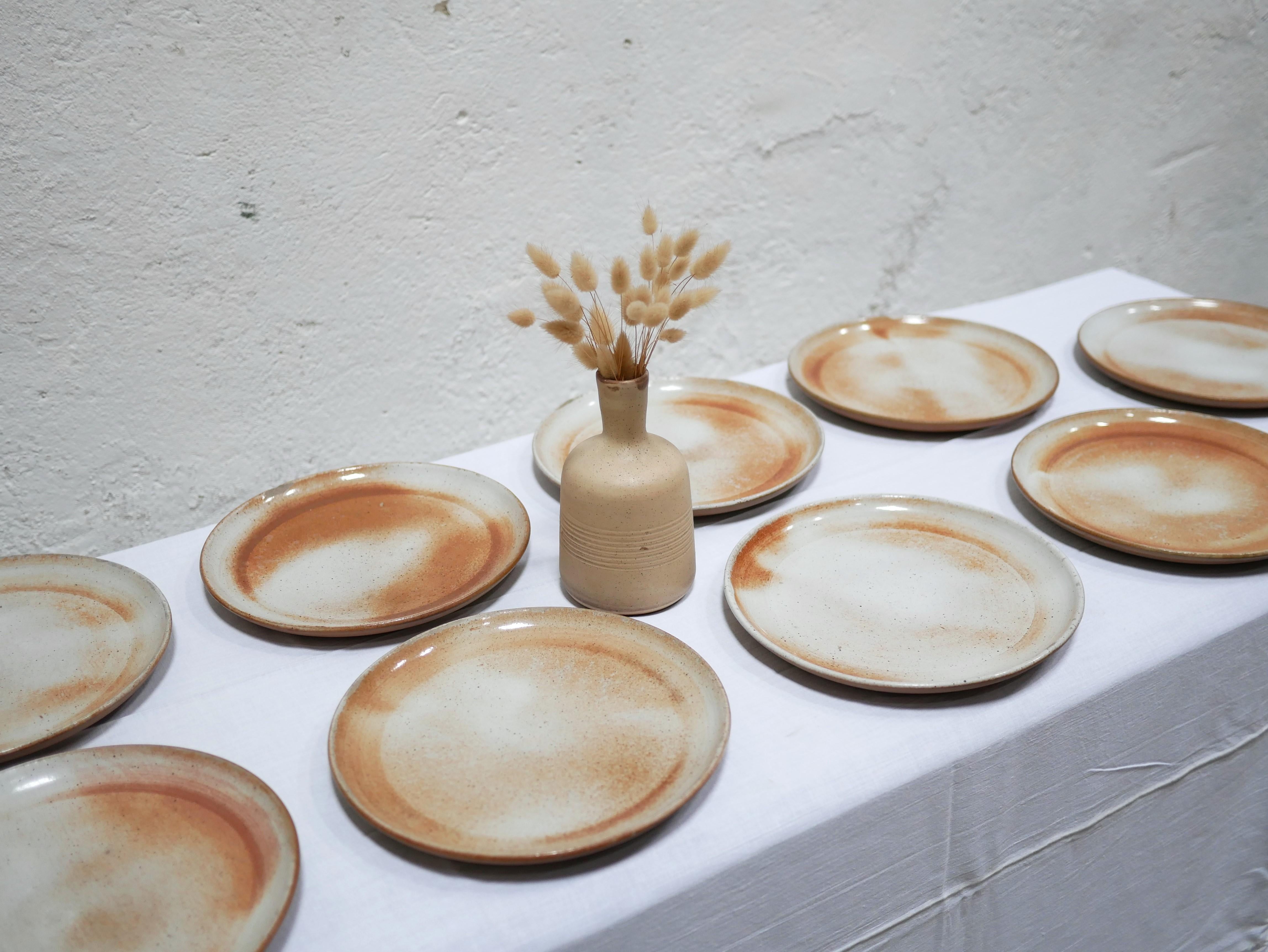 20th Century Series of 9 vintage stoneware plates by the Poteries du Marais, France