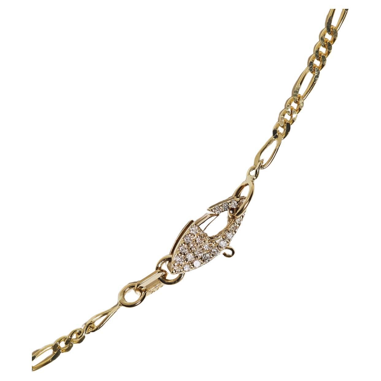 Series of Eleven Diamond Clasp 14k Gold Figaro Chain Necklace For Sale