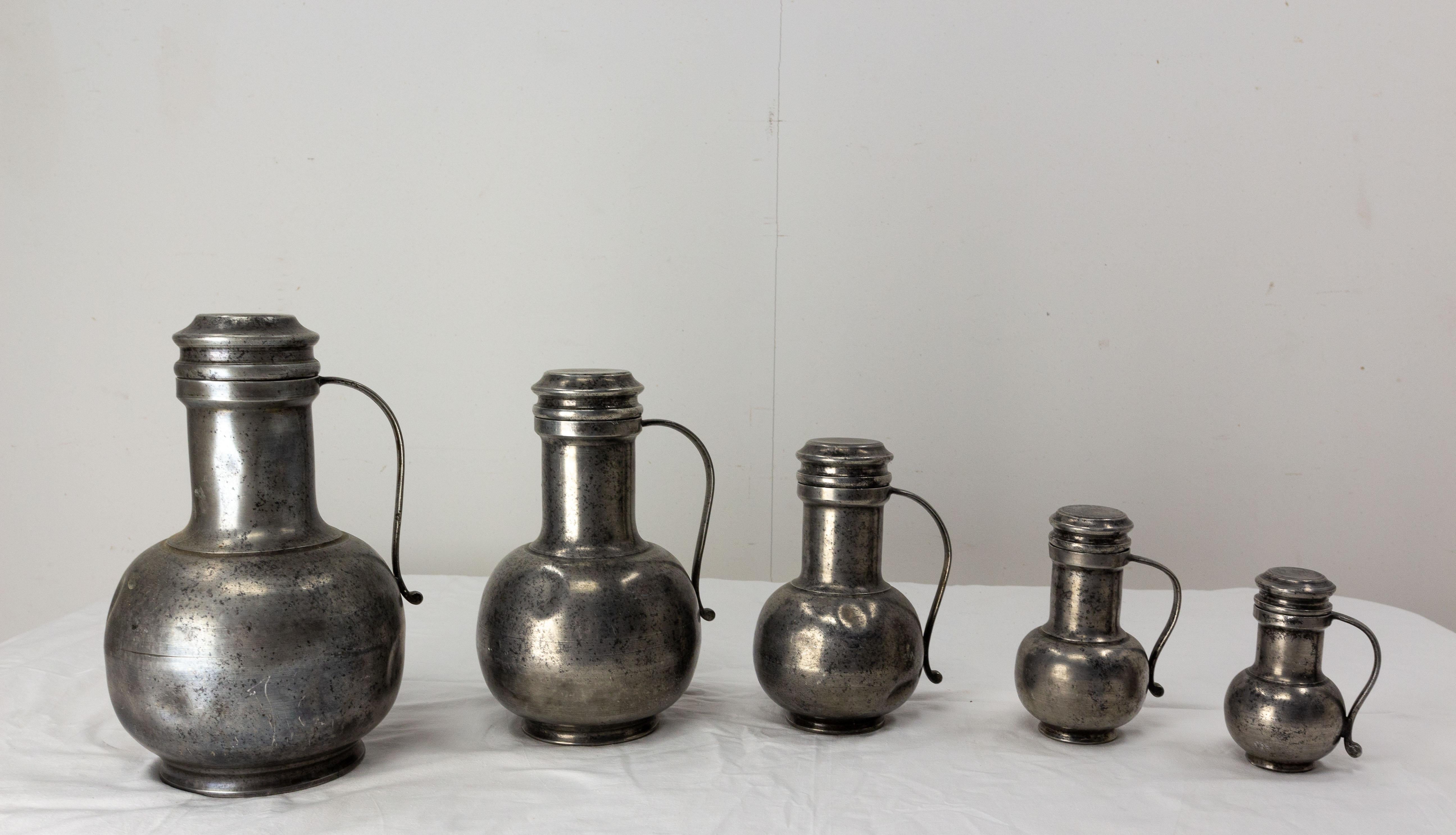 Industrial Series of Five Tin Pitchers, France, Late 18th Century For Sale