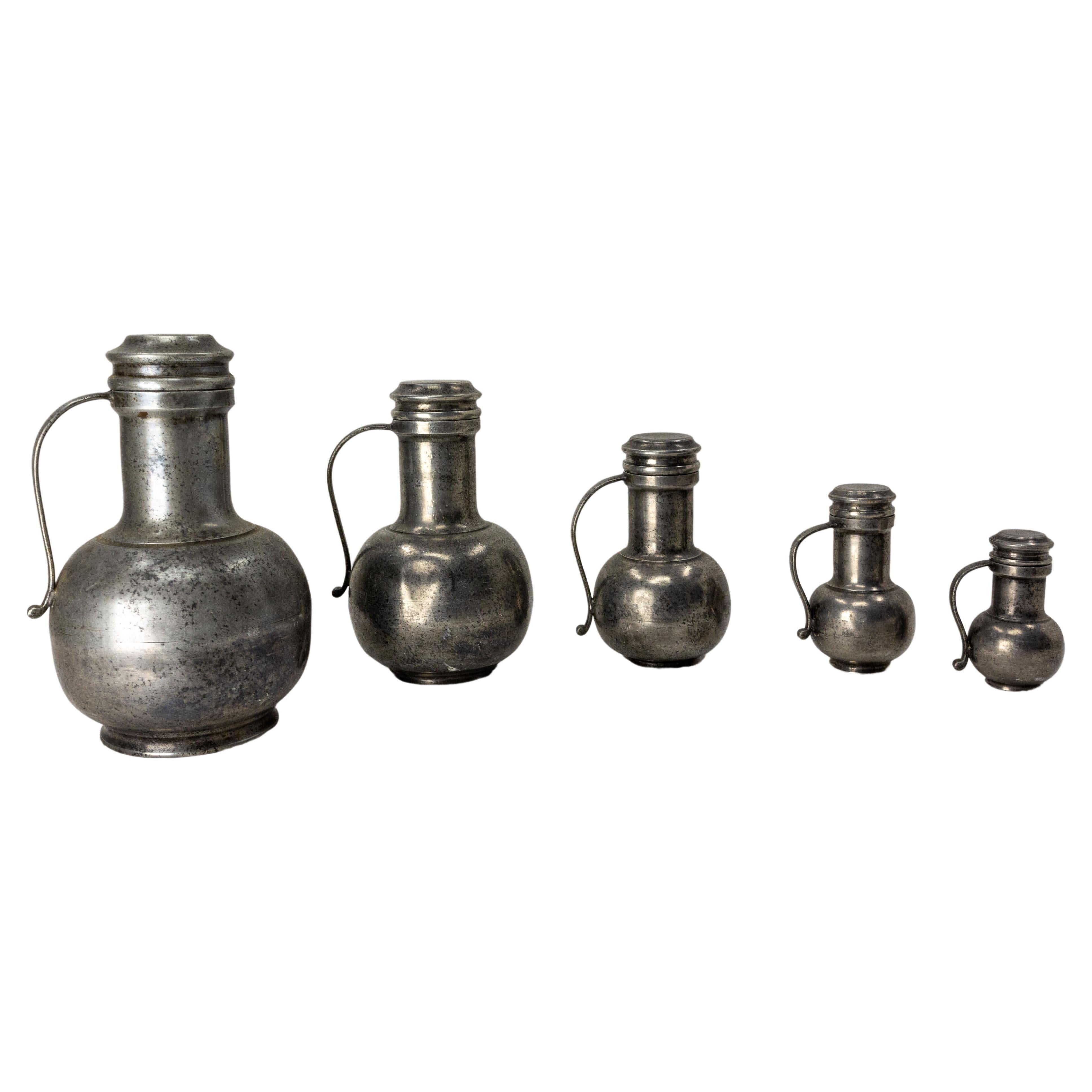 Series of Five Tin Pitchers, France, Late 18th Century For Sale