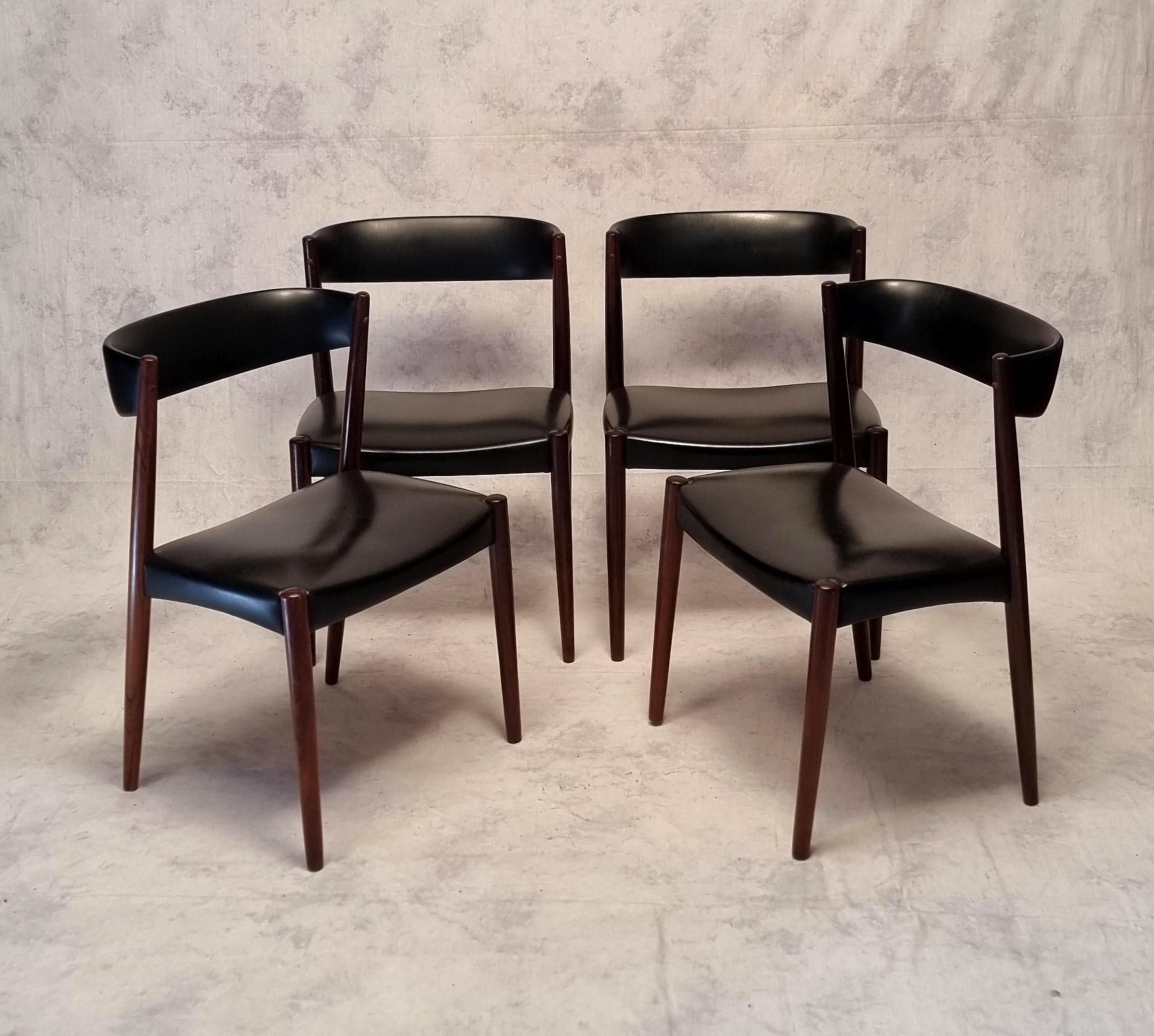 Set of four vintage Scandinavian chairs produced by Vejle Mobelfabrik in the 1960s. Work in solid Rio rosewood in the spirit of Kai Kristiansen. The veining is magnificent. Dynamic design with the thin shell back, joined by two oblique uprights.