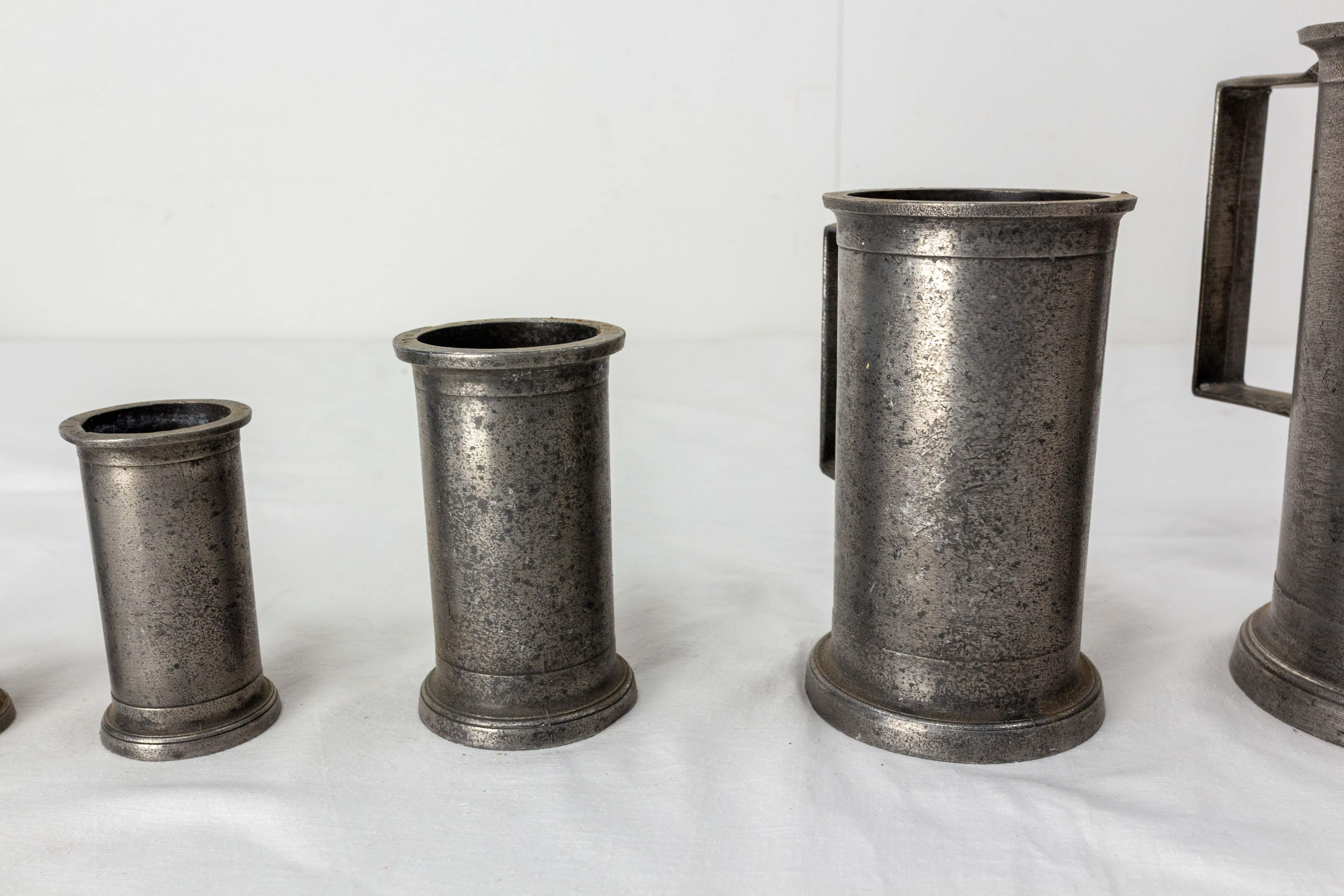 French Series of Measuring Tins, Trade Equipment, France, 19th Century For Sale