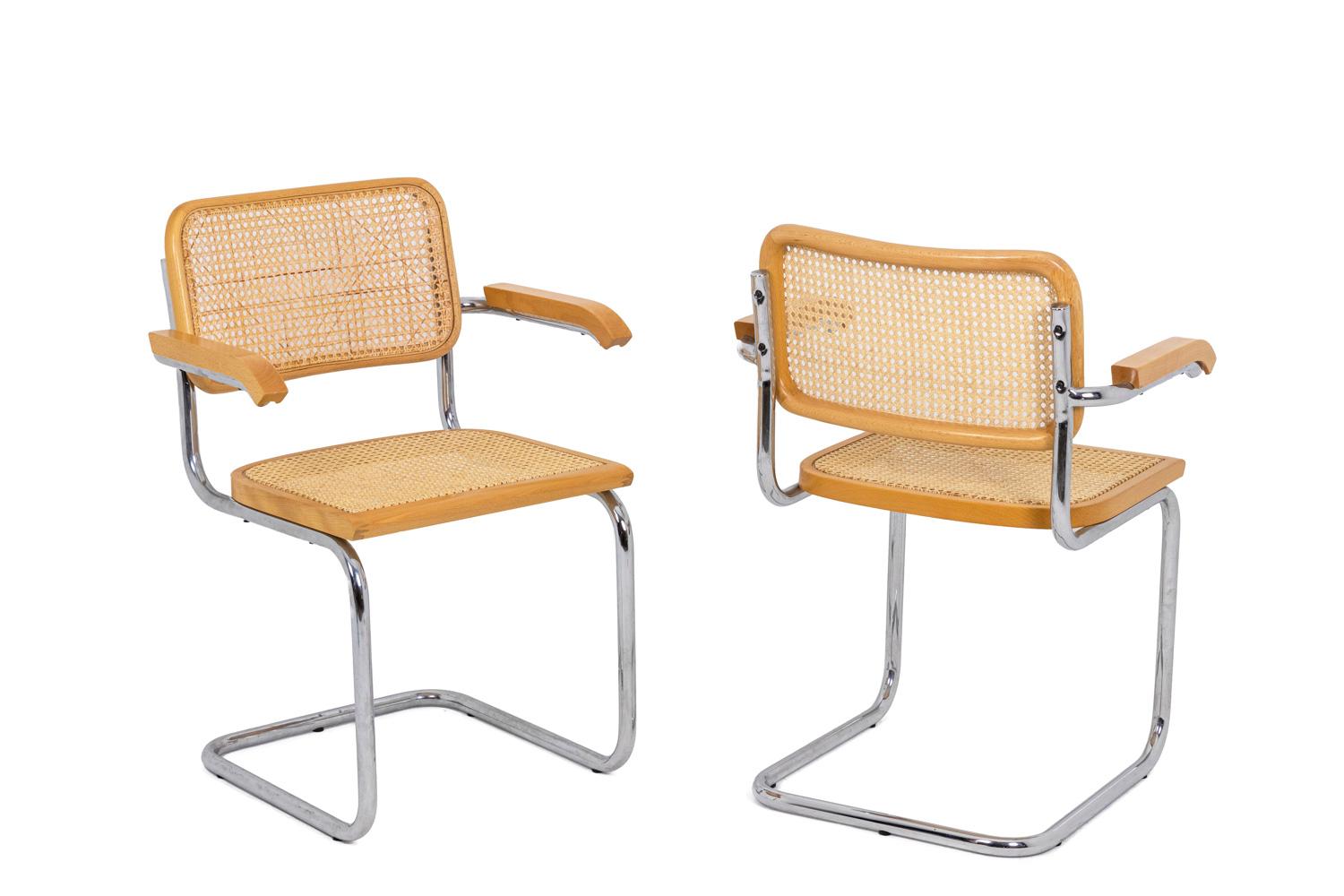 Marcel Breuer, attributed to.

Series of six armchairs in varnished blond beech. Seat and back upholstered in blond cane attached to a tubular structure of round section in chromed and folded steel. Armrests in varnished blond beech.

Italian