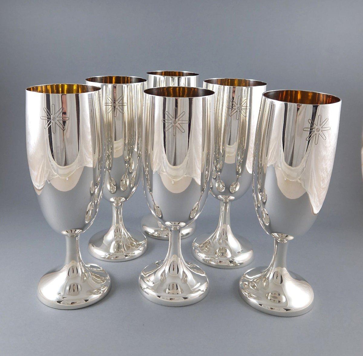 Series of six glasses in sterling silver and gilt 
Silver hallmark 800 
Height: 18 cm 
Weight: 1042 grams