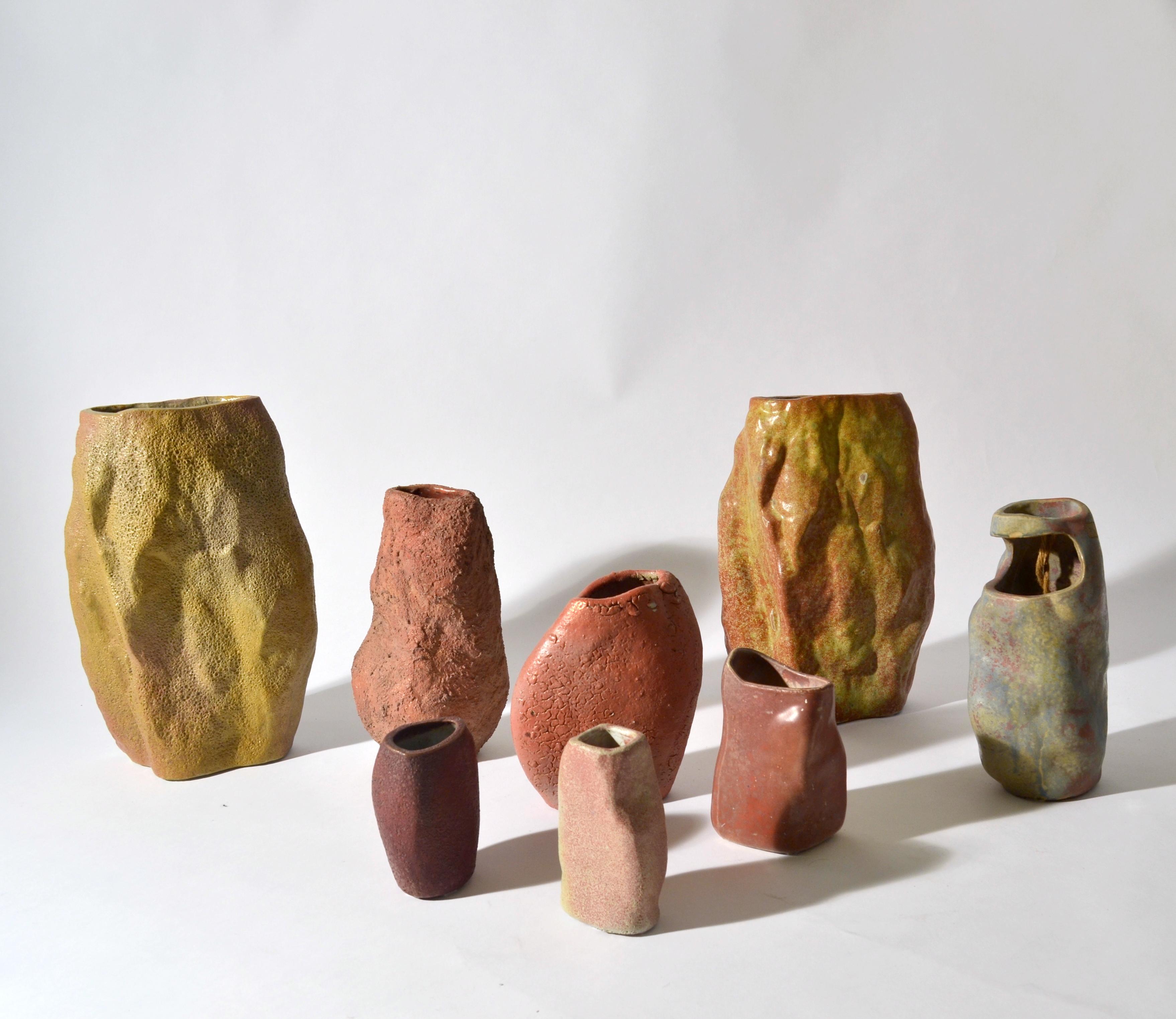 Group of eight rock shape Studio Pottery 1960s vases. They all have a unique appearance in shape, glaze colors and textures resembling the rock Formations in nature. It is a one-of-a-kind collection. They are purchased from the family of the