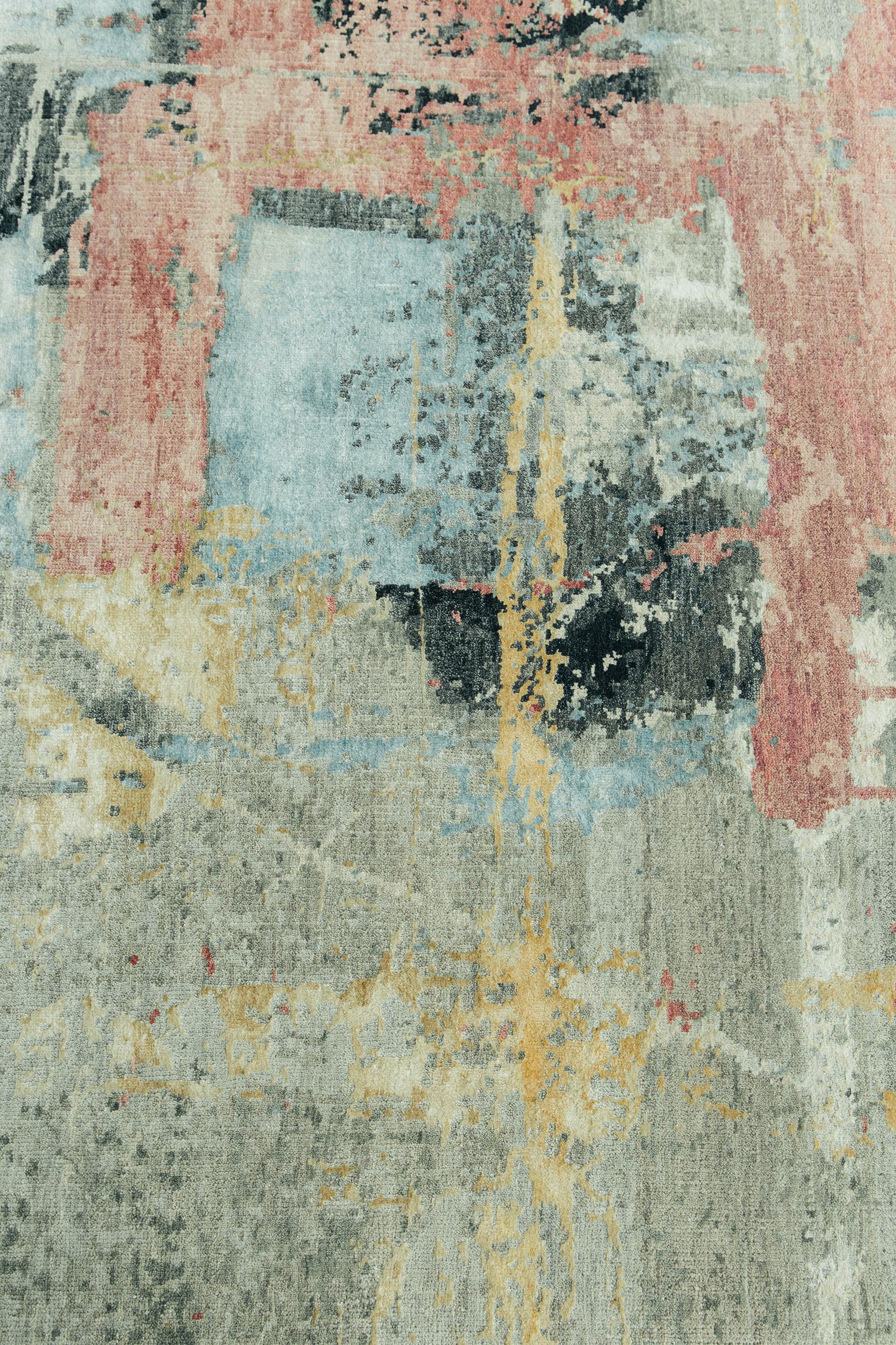 Ähnlich wie Granit ähnelt unser Serizzo-Teppich den organischen und fließenden Elementen von Stein und hinterlässt mit seinen kontrastreichen Farben bleibende Eindrücke. Die Blau-, Gelb- und Rosatöne von Ottika verleihen dem Stück aus Seide und