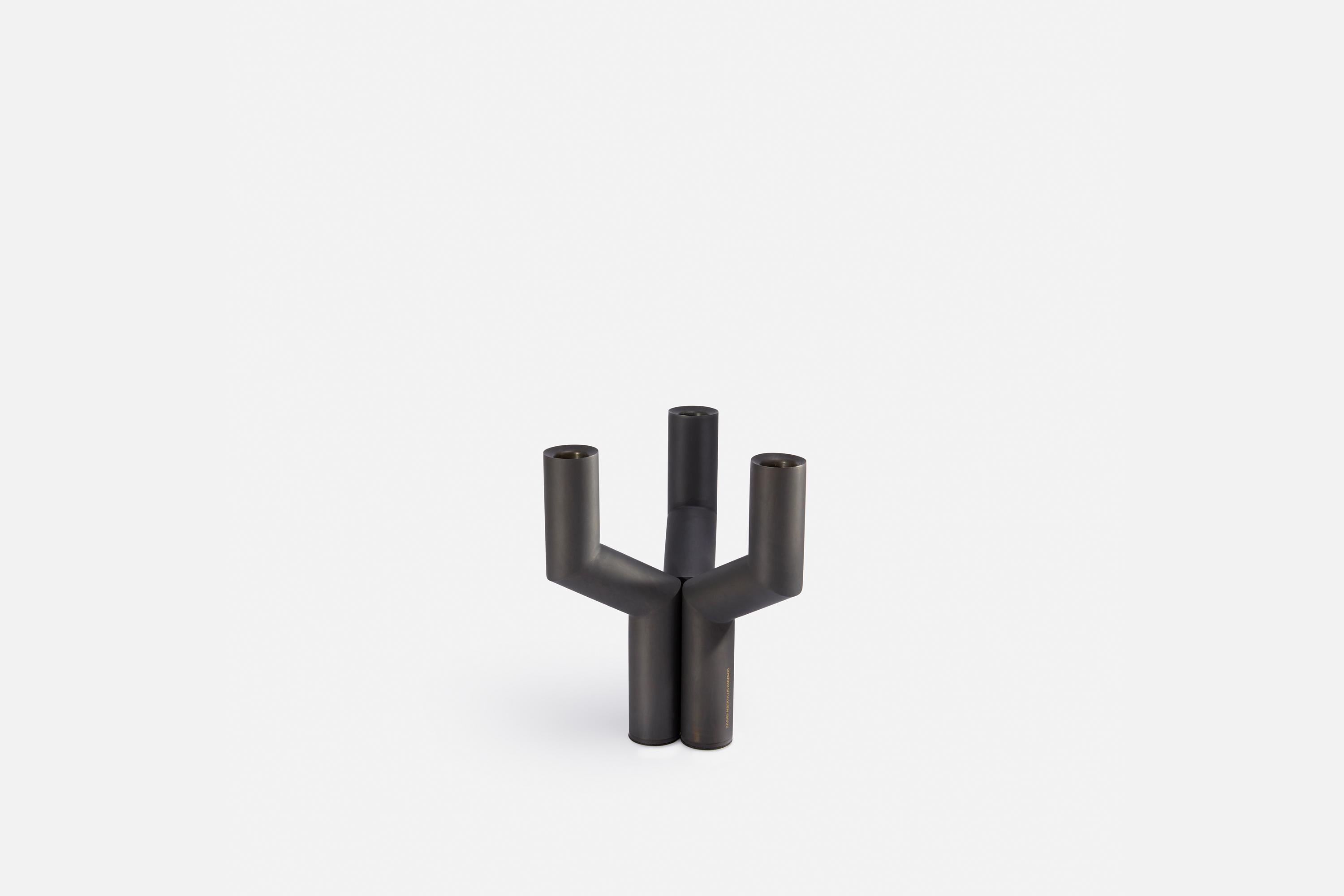 The Sermon candle holder, first released in 2021, celebrates Brutalist aesthetics and comes in two different finishes.
The solid metal candle holder has been envisioned as an austere ritual artefact, a quality that lends it its name. It consists of